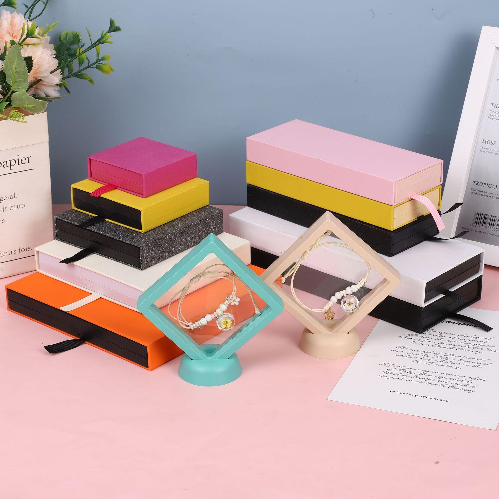 3D Floating Display Box, Dustproof Jewelry Packaging, Transparent Hanging Storage Box for Storing Necklaces, Bracelets, Rings, Coins, Earrings, and Pins, with Elastic Film, Gift Box for Retail and Personal Use.