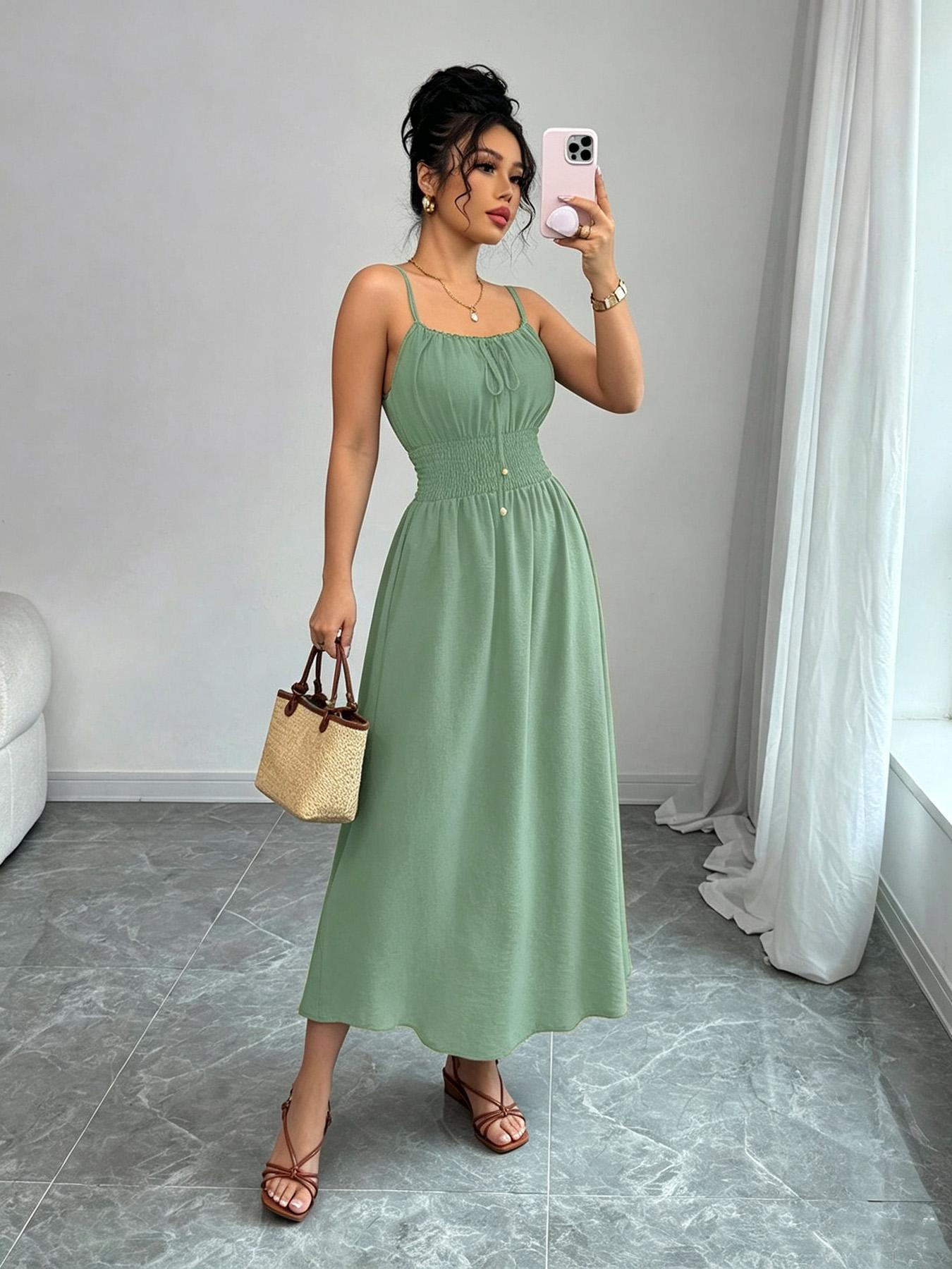 A women's fashionable and high-end French gentle style waist cinching spaghetti strap camisole dress with lace up bead design, suitable for summer, beach wear, dates, dinners, and travel Straps Summer Dress