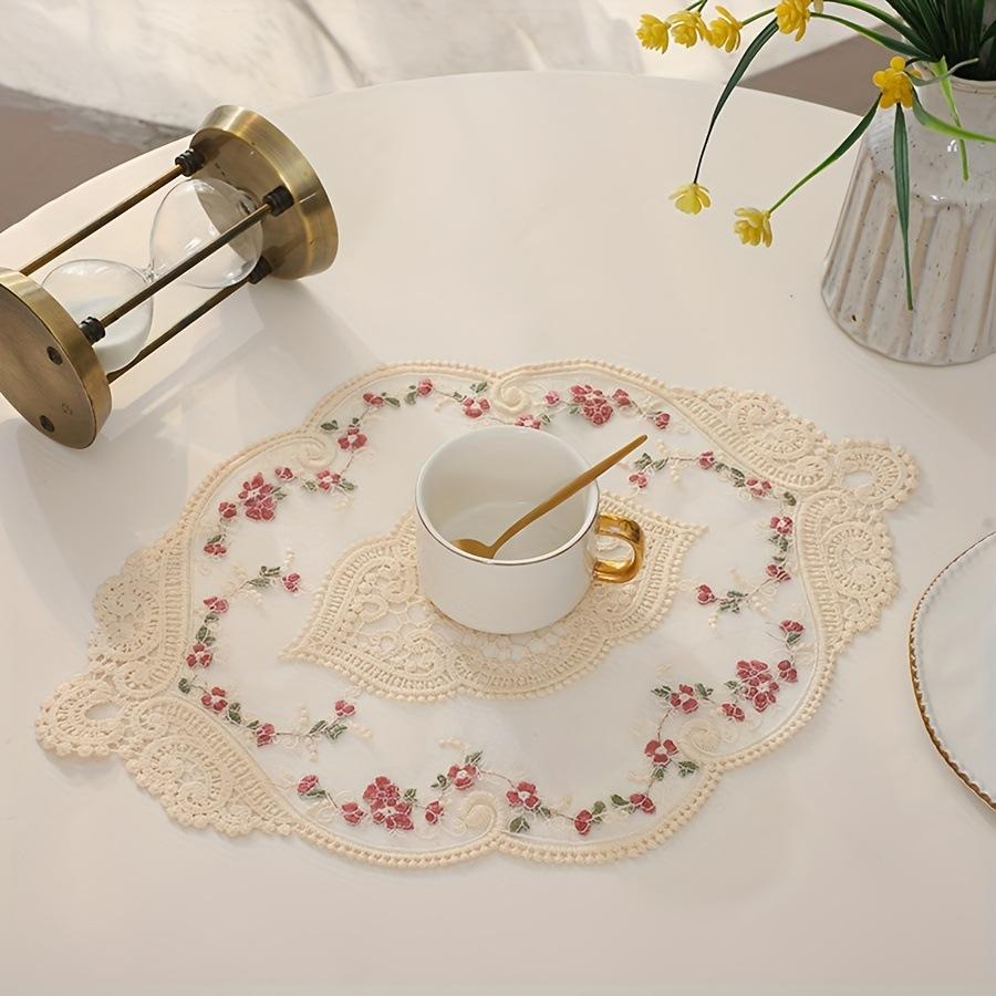 1 piece, a vintage-style handmade crochet round mat with polyester fabric, featuring elegant hollow designs and floral motifs, suitable for weddings, dining utensils, parties, Valentine's Day, Easter, St. Patrick's Day, and carnival celebrations.
