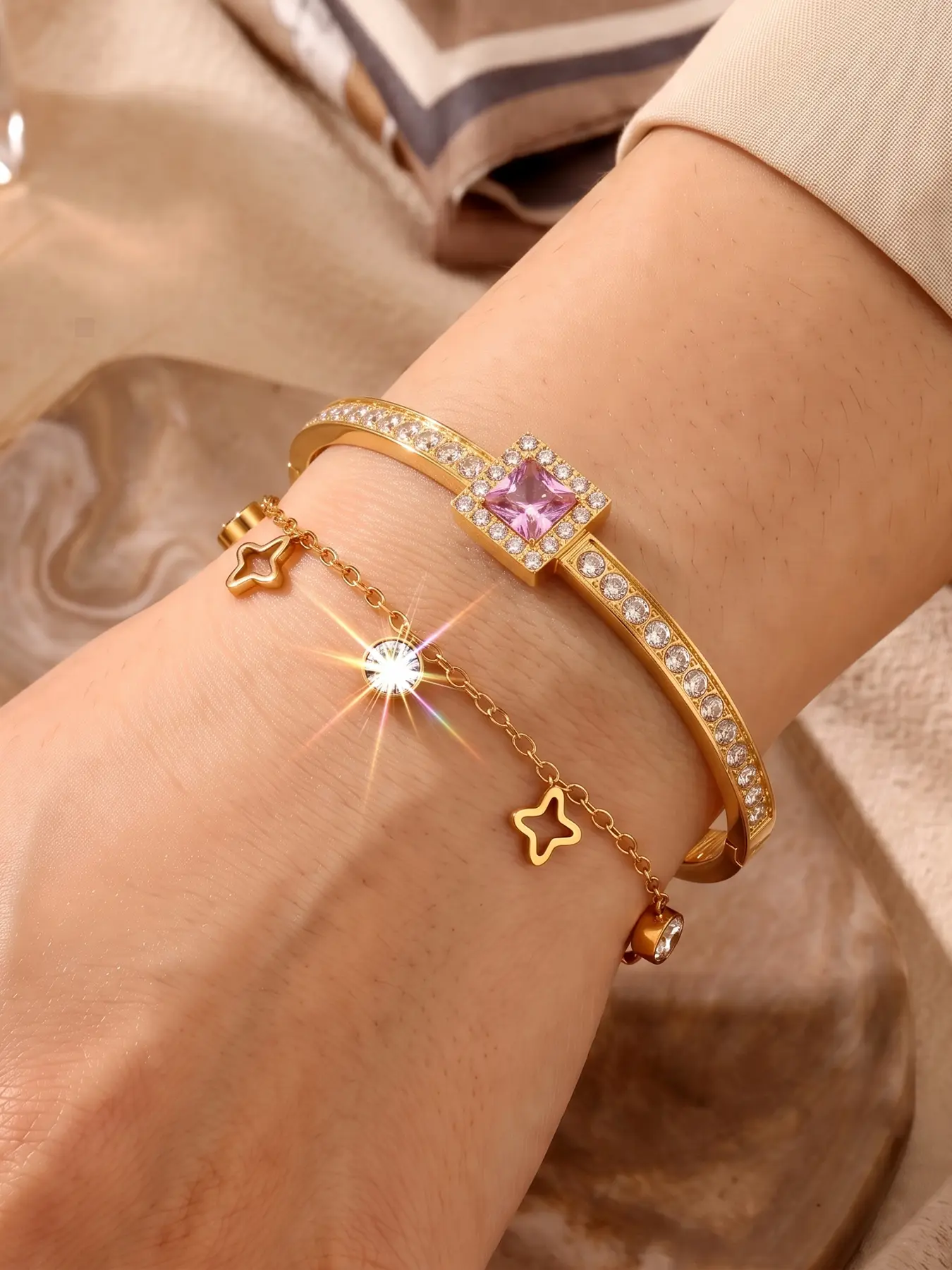 2pcs pink square diamond set with zircon star tassel double layered set, warm toned gold-plated with dreamy pink diamonds, the full diamond bracelet body shines eye-catching, and the soft lines complement the slender wrist
