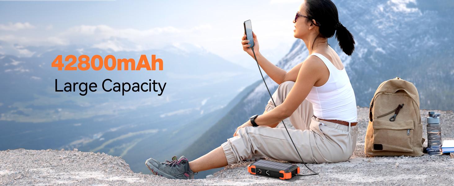 Sudrov 42800 mAh Solar Charger Power Bank Wireless Charger Built in 4 Cables 7 Outputs 15 Watts Fast Charging Power Bank for All Mobile Devices 3 Inputs Solar Portable Charger with Dual Flashlights, Carabiner and Thermometer Sudrov 42800 mAh Solar Charger Power Bank Wireless Charger Built in 4 Cables 7 Outputs 15 Watts Fast Charging Power Bank for All Mobile Devices 3 Inputs Solar Portable Charger with Dual Flashlights, Carabiner and Thermometer