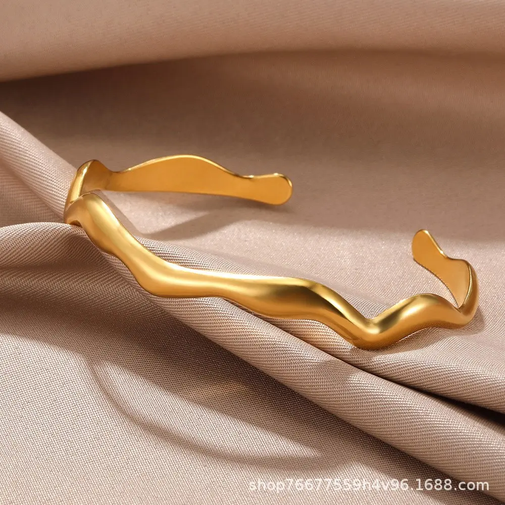 Wave shaped open bracelet