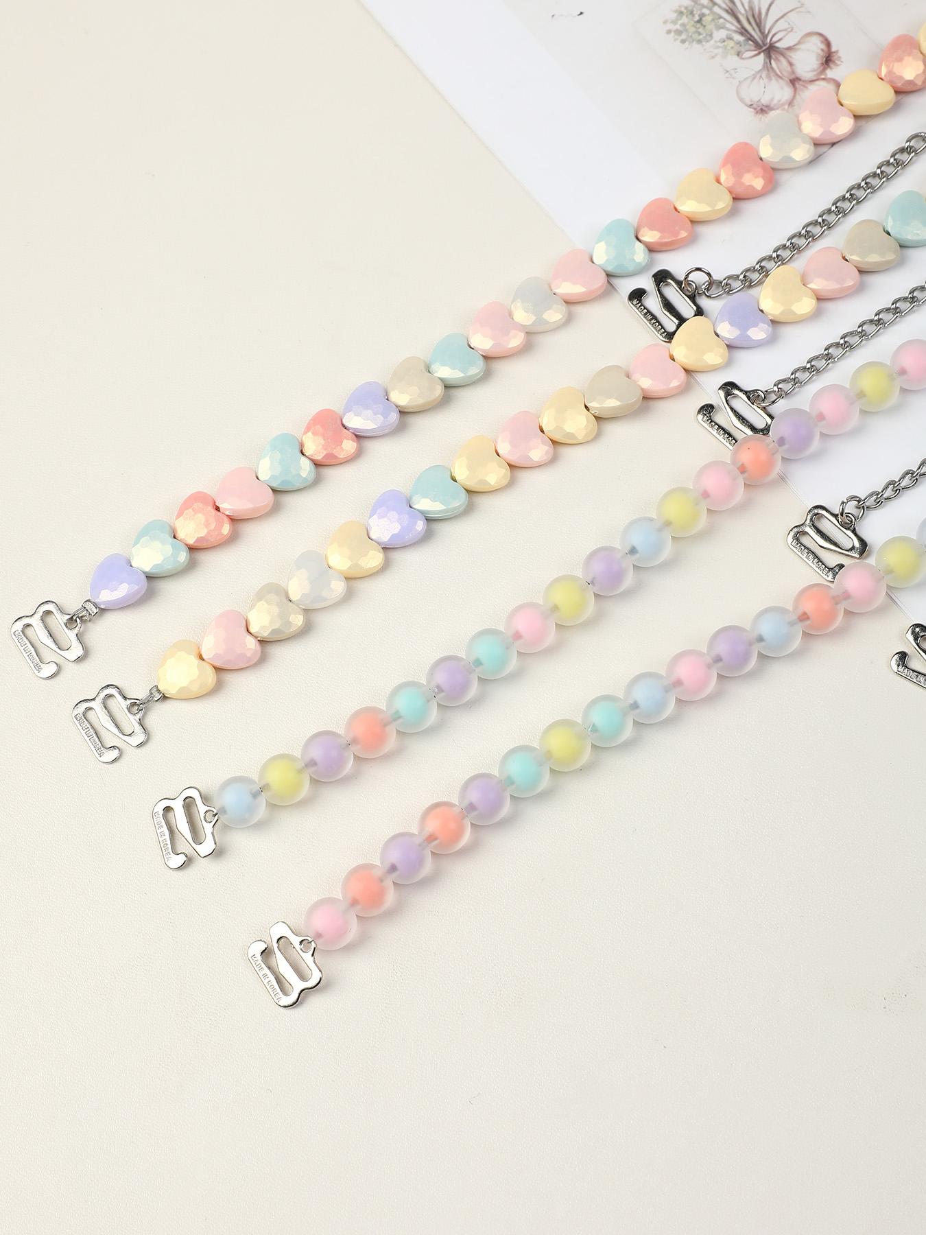 Macaron-colored heart-shaped round bead bra straps, candy-hued resin-beaded invisible lingerie straps, non-slip and wearable as an exposed accessory—perfect for everyday outfits and summer styling.