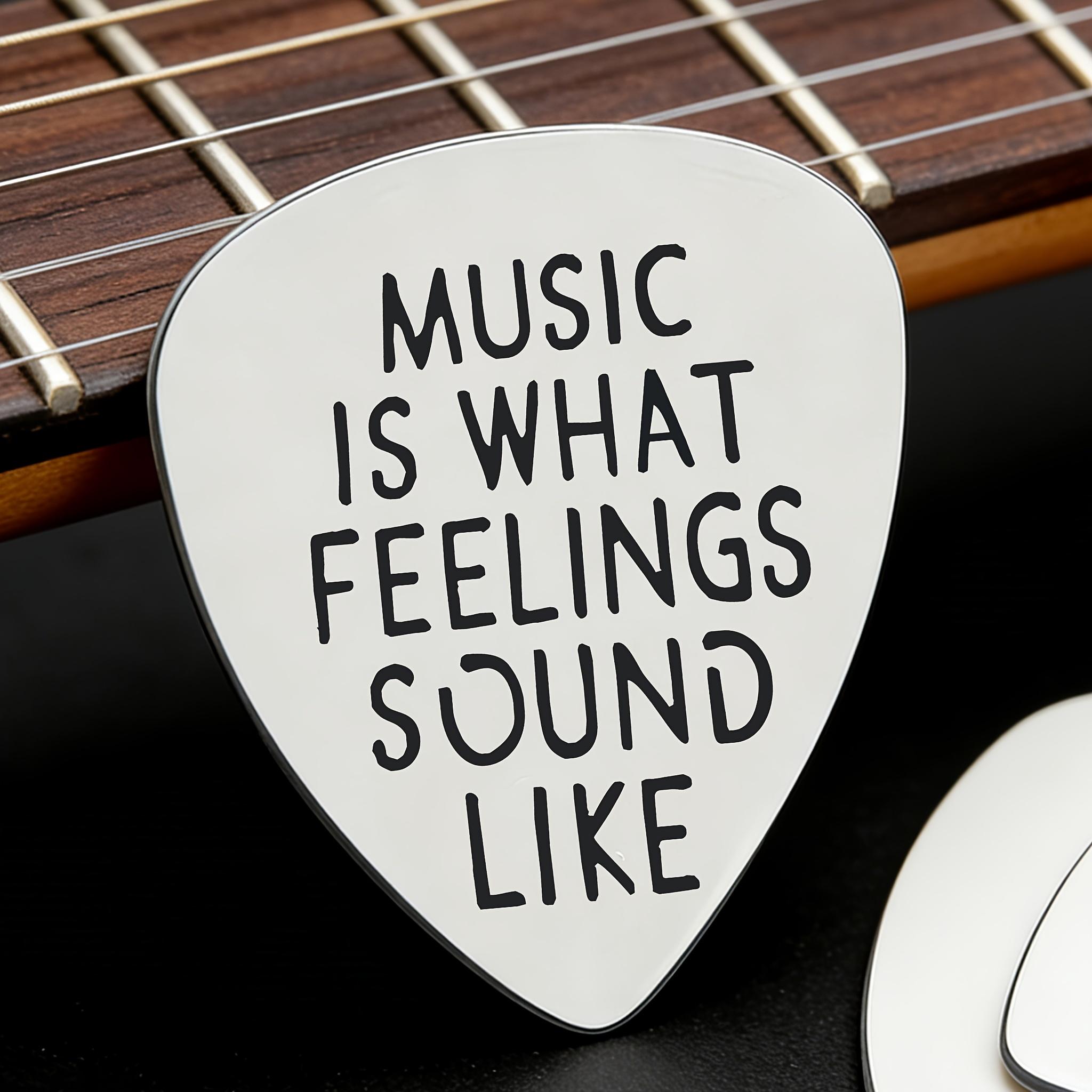 Stainless steel guitar pick, engraved with "MUSIC IS WHAT FEELINGS SO LIKE" literary music copy, suitable for music lovers, guitarists, birthdays, graduation, Christmas, music festivals gifts