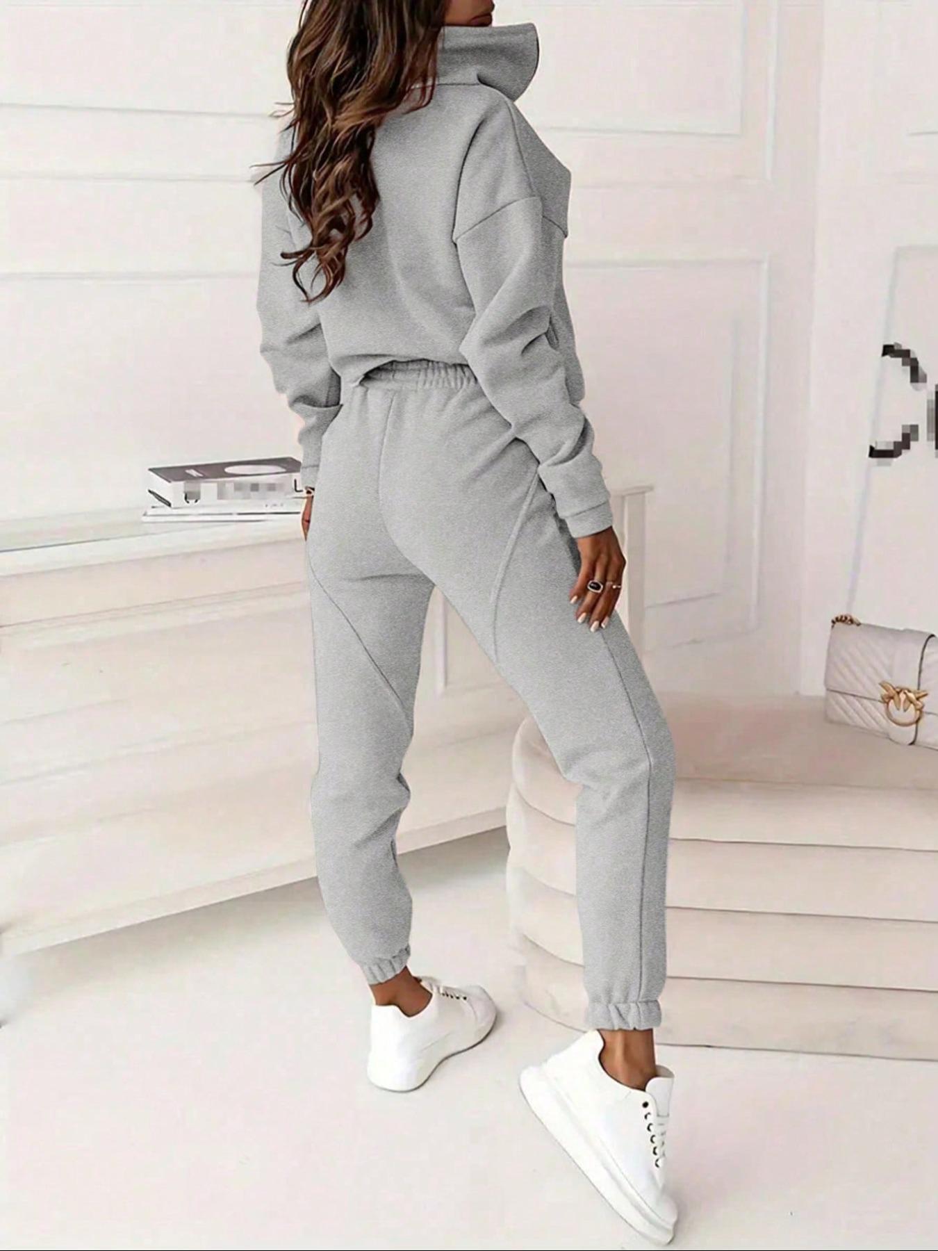 Two-piece women's solid-color crew-neck pullover with long sleeves and elastic waist and loose-fitting bottom pants, perfect for all occasions and versatile in style.