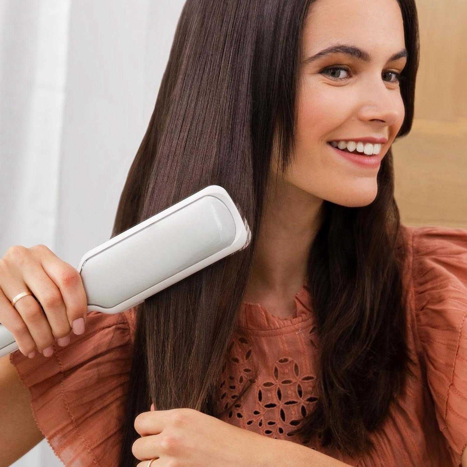 The 2 inch Hair Straightener Iron is a professional ceramic flat iron designed for hair styling. It's infused with argan oil and keratin, aiming to reduce frizz and make your hair shinier and smoot Therapy Comfort iscan portable results whimsical umbrella