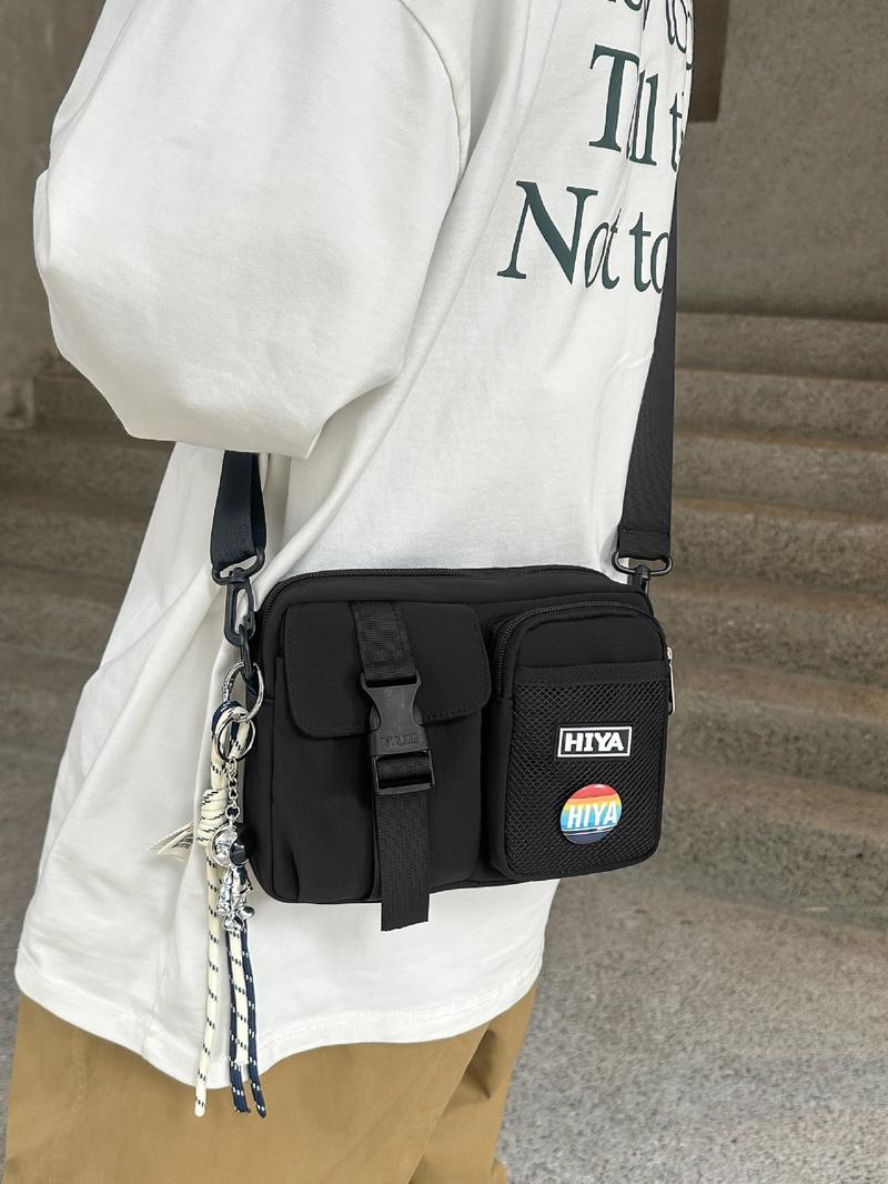 Unisex Casual Plain Color Release Buckle Crossbody Bag with Astronaut Charm, Fashionable Versatile Zipper Crossbody Bag with Random Color Badge, Trendy Shoulder Bag for Daily Use, Adjustable Crossbody Bag