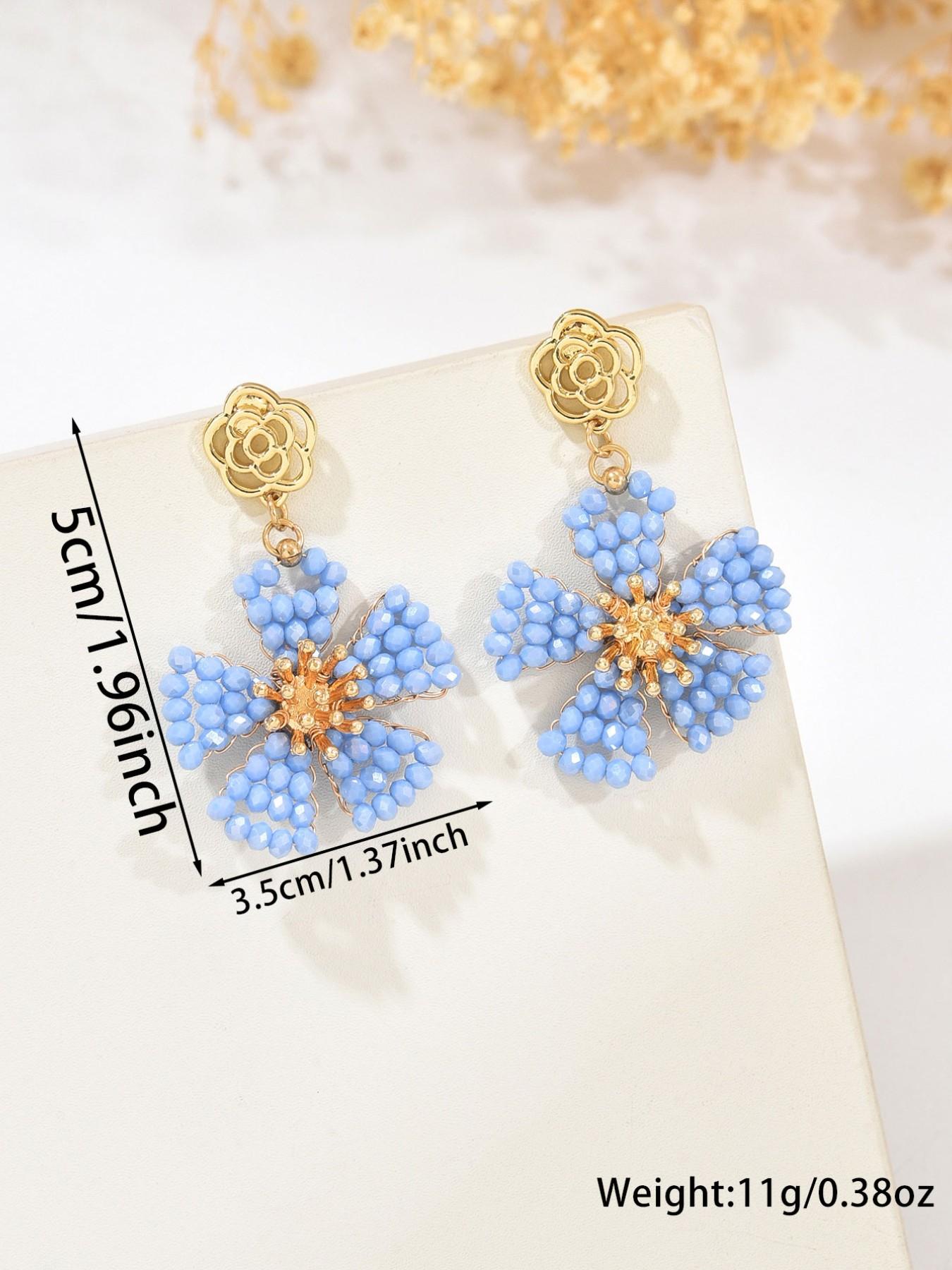 A pair of handcrafted, bohemian-style vintage dangle earrings featuring beaded floral designs—the perfect gift for a loved one, mother, or friend. An ideal present for Valentine's Day, Mother's Day, International Women's Day, wedding season, Thanksgiving