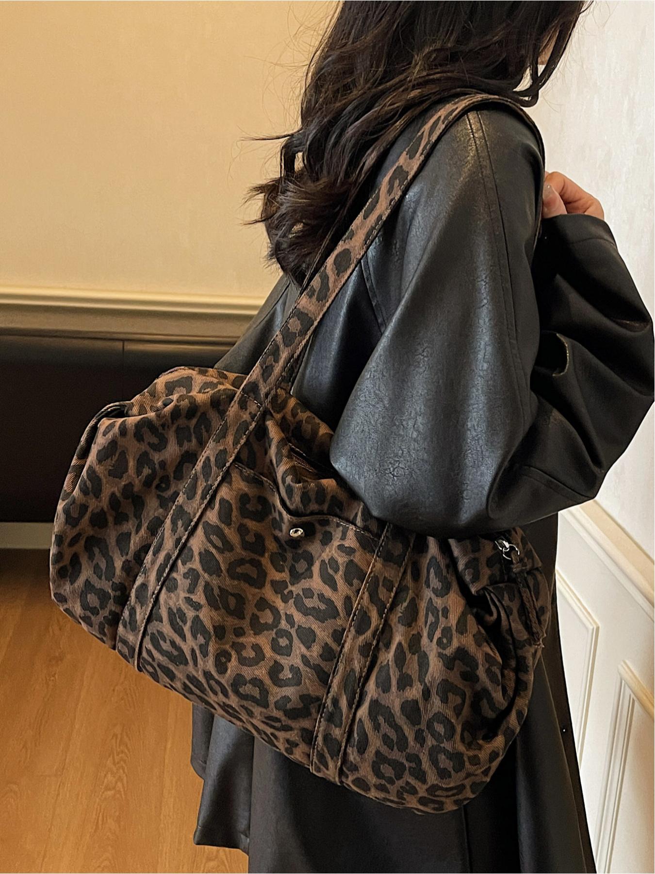 Large capacity denim leopard print luggage bag, made of tough fabric suitable for urban life, with non glaring prints, niche design, versatile tote bag, convenient sports bag, Denim shoulder satchel