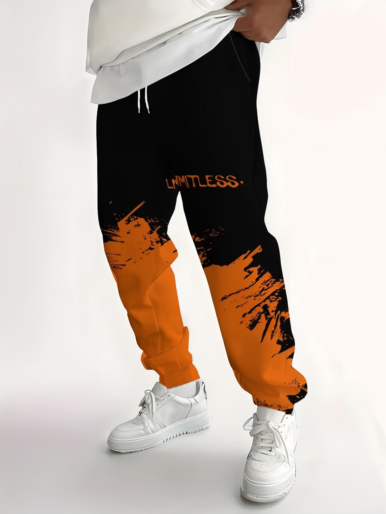 Stylish Men's Printed Track Pants with Gradient Orange Print, Drawstring and Pockets. Comfortable and Casual, Made of Stretch Polyester.