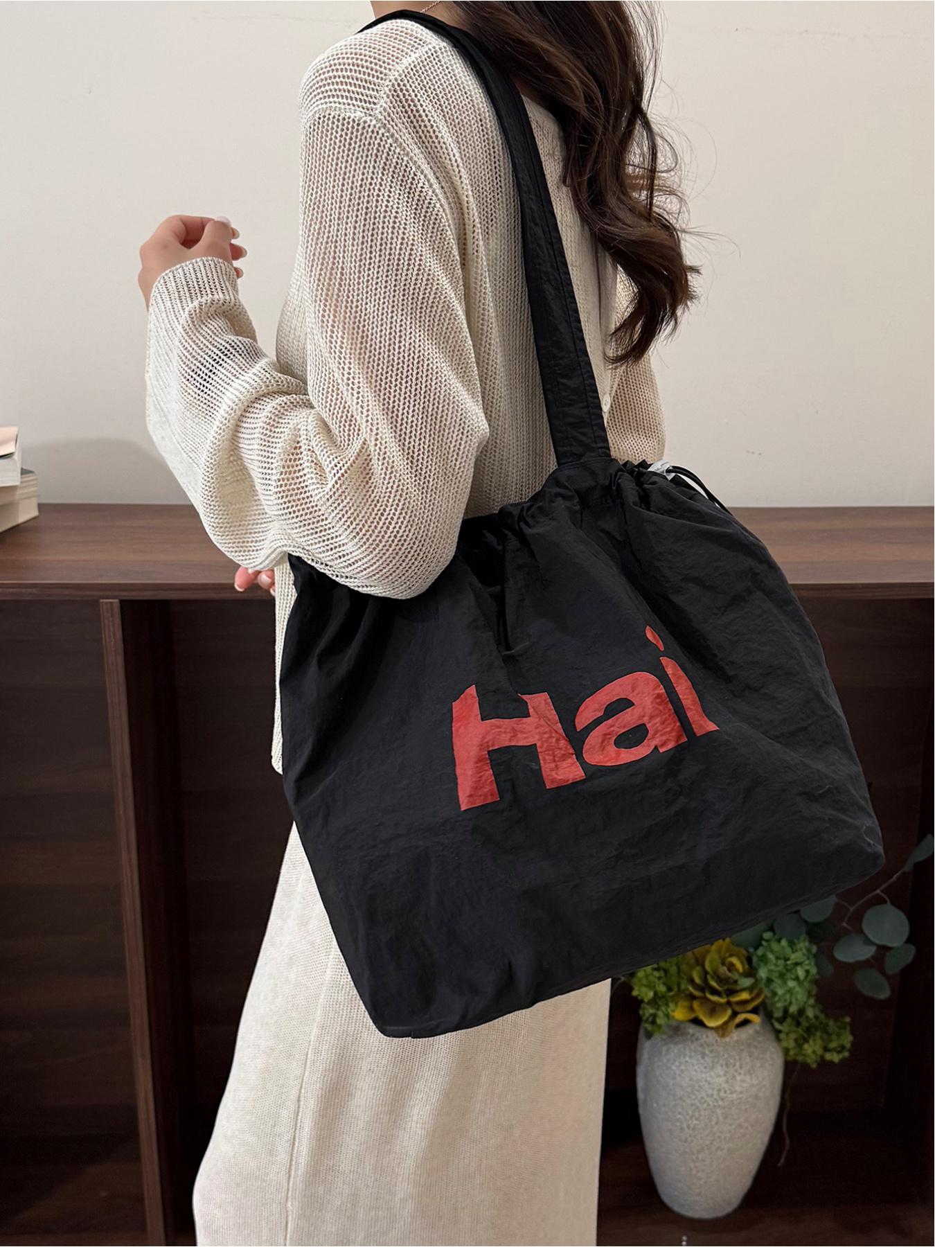 Large capacity drawstring tote bag with letters, simple casual shoulder bag, lightweight and comfortable, street style, work, shopping, underarm bag