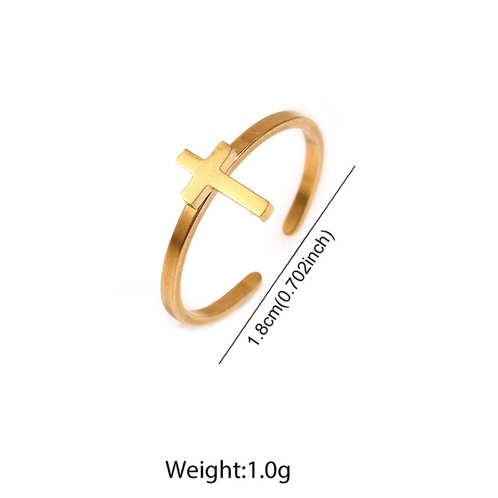 Exclusive and moderately luxurious cross-shaped open ring for couples. A pair of stainless steel jewelry for hands.