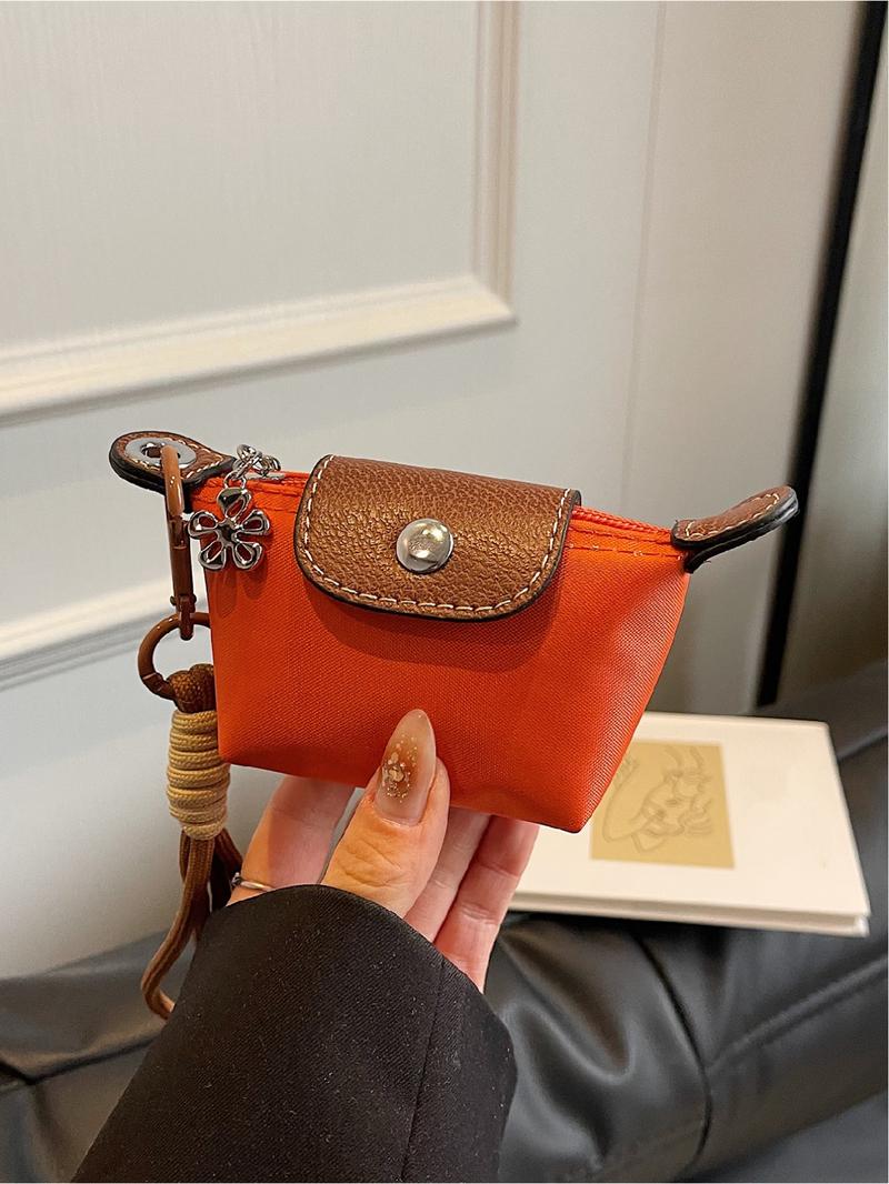 Mini women's flip button casual and compact handbag, wrist pocket, multiple colors to choose from, suitable for daily clothing matching, fashionable for going out.