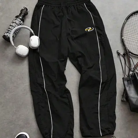 Men's Casual Sporty Long Pants, Casual Sportswear Pants, Athleisure Track Pants, Loose Sports Pants, Loose Fit with Elastic Cuffs, Fashion Letter Print, Lightweight Fabric for Daily Wear, Casual Sport Trousers, Casual Athletic Trousers