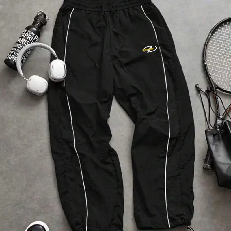 Men's Casual Sporty Long Pants, Casual Sportswear Pants, Athleisure Track Pants, Loose Sports Pants, Loose Fit with Elastic Cuffs, Fashion Letter Print, Lightweight Fabric for Daily Wear, Casual Sport Trousers, Casual Athletic Trousers
