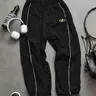 Men's Casual Sporty Long Pants, Casual Sportswear Pants, Athleisure Track Pants, Loose Sports Pants, Loose Fit with Elastic Cuffs, Fashion Letter Print, Lightweight Fabric for Daily Wear, Casual Sport Trousers, Casual Athletic Trousers