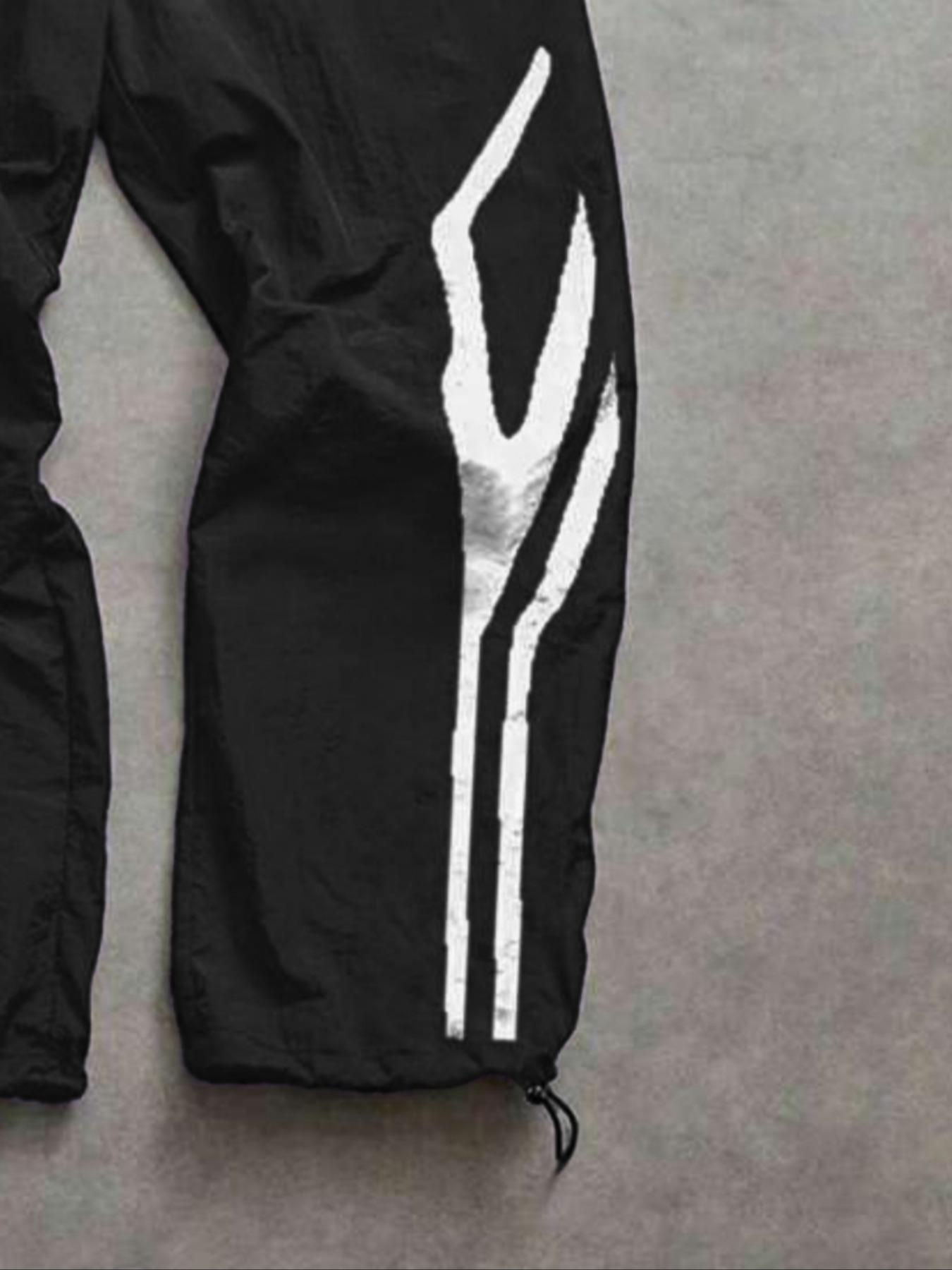 Men's Fashion Casual Sports Pants, Athleisure Style Bottoms, Unique Print, Loose Fit, Nylon Fabric, Lightweight Comfort, Waist Drawstring, Adjustable Ankle Cuff Men's Fashion Casual Sports Pants, Athleisure Style Bottoms, Unique Print, Loose Fit, Nylon Fabric, Lightweight Comfort, Waist Drawstring, Adjustable Ankle Cuff