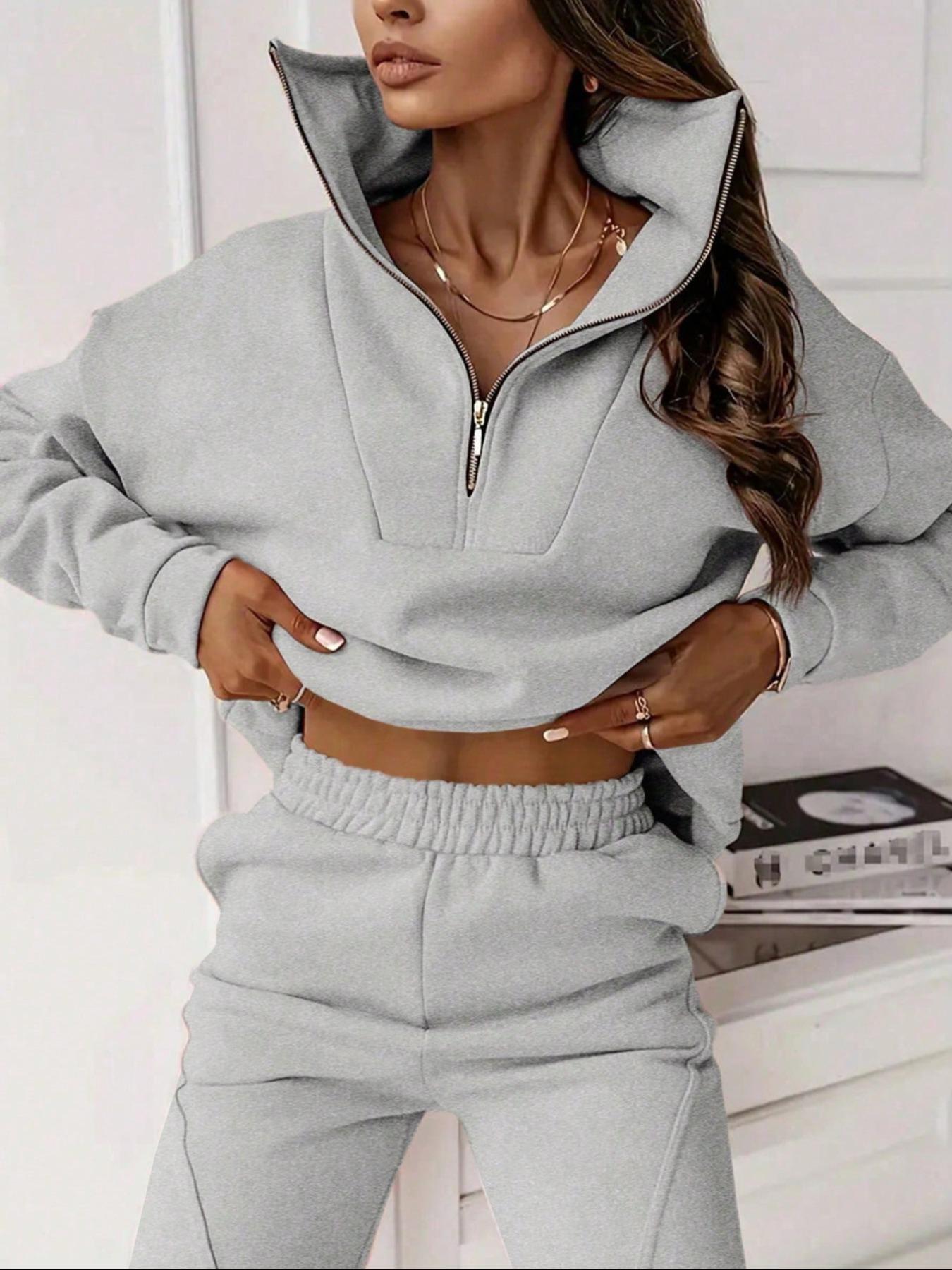 Two-piece women's solid-color crew-neck pullover with long sleeves and elastic waist and loose-fitting bottom pants, perfect for all occasions and versatile in style.