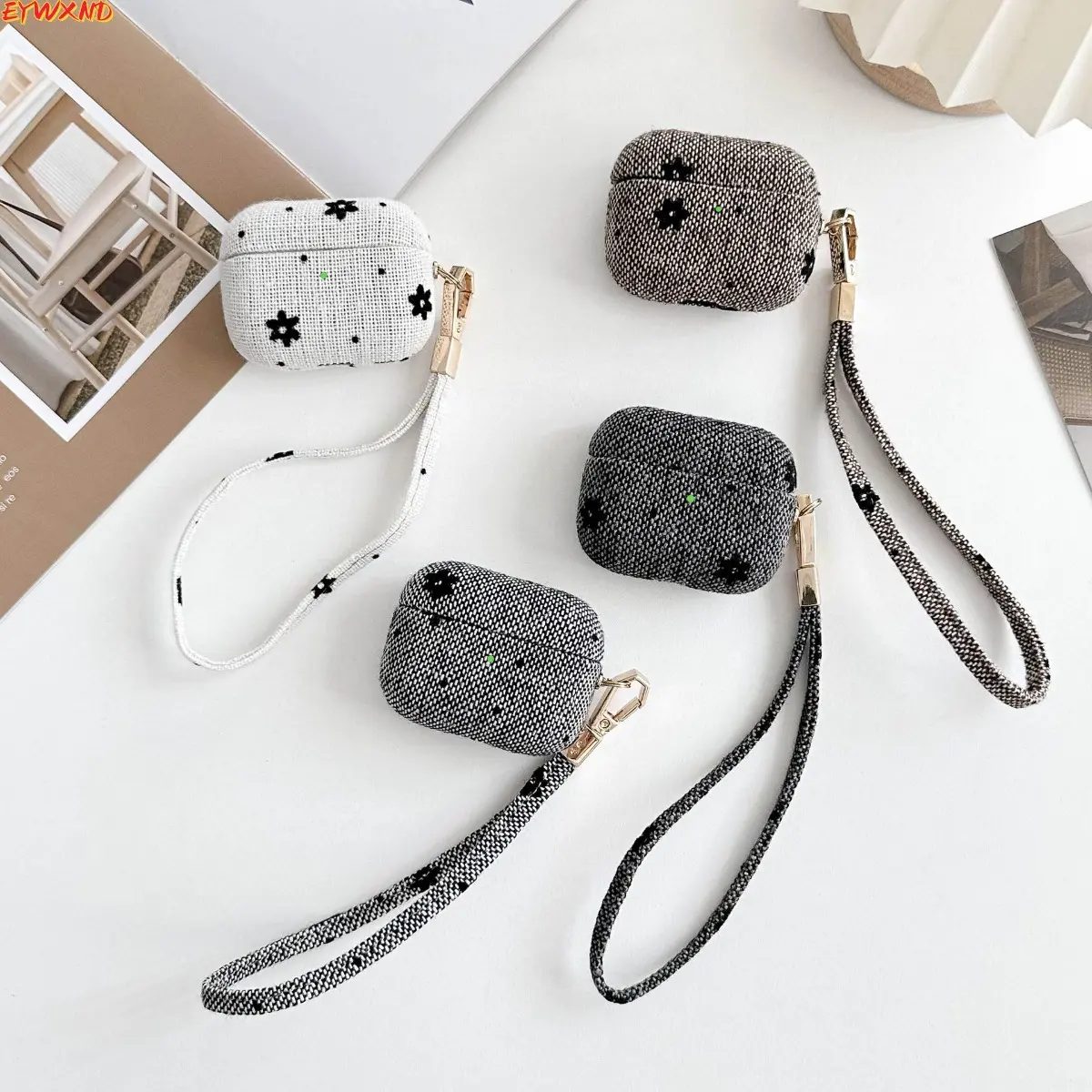 EYWXND A new snowflake linen textured protective case for Apple AirPods Pro 2nd generation Bluetooth headphones.