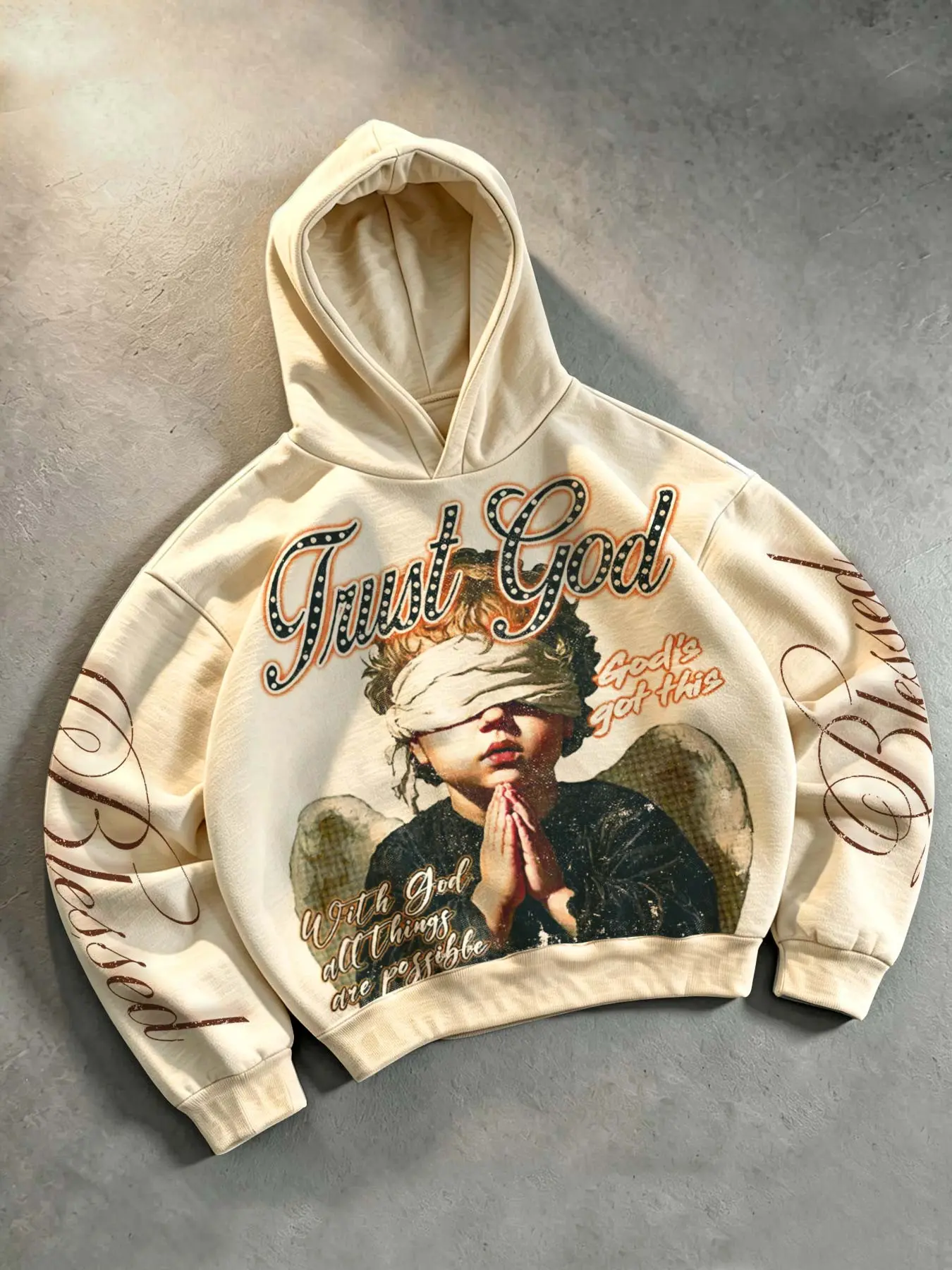 Back-to-school season outfit pick: Retro oil painting style angel pullover hoodie for men, featuring a blindfolded praying angel print and the letter "Trust God." Loose-fitting, drop-shoulder hoodie for men and women, high-street hip-hop style.