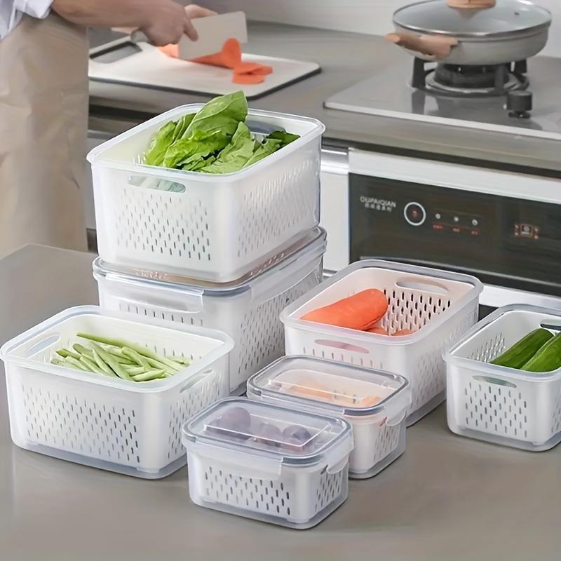 Stackable refrigerator storage container with removable drain basket. Suitable for kitchen storage containers made with BPA-free polypropylene Kitchen Drain Fresh Fruits and Vegetables Grocery Seal Moisture Resistant