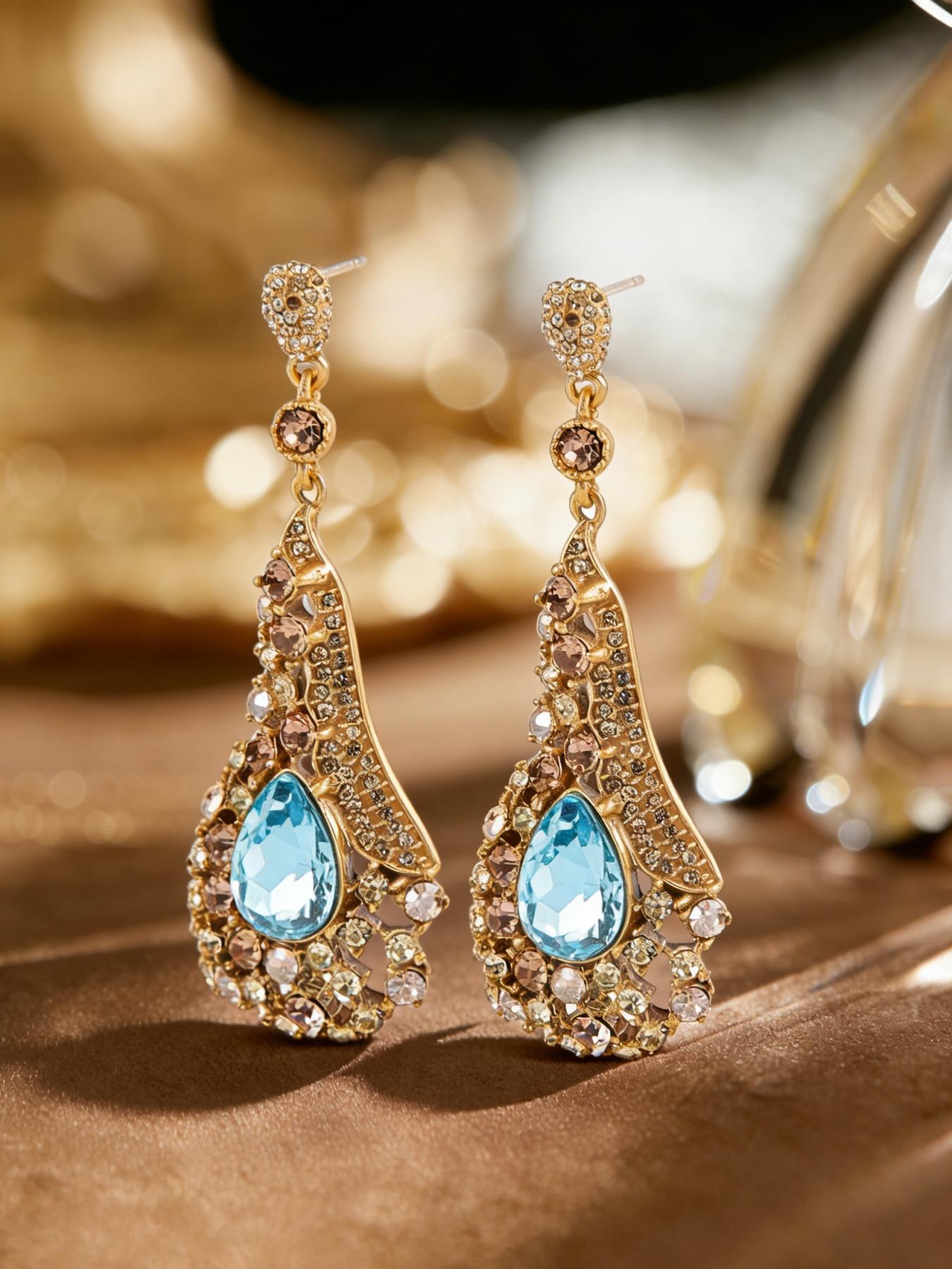 A pair of vintage noble teardrop shaped sapphire pendant earrings, suitable for daily wear, vacation dates, and other occasions, and also a surprising and exquisite small gift.