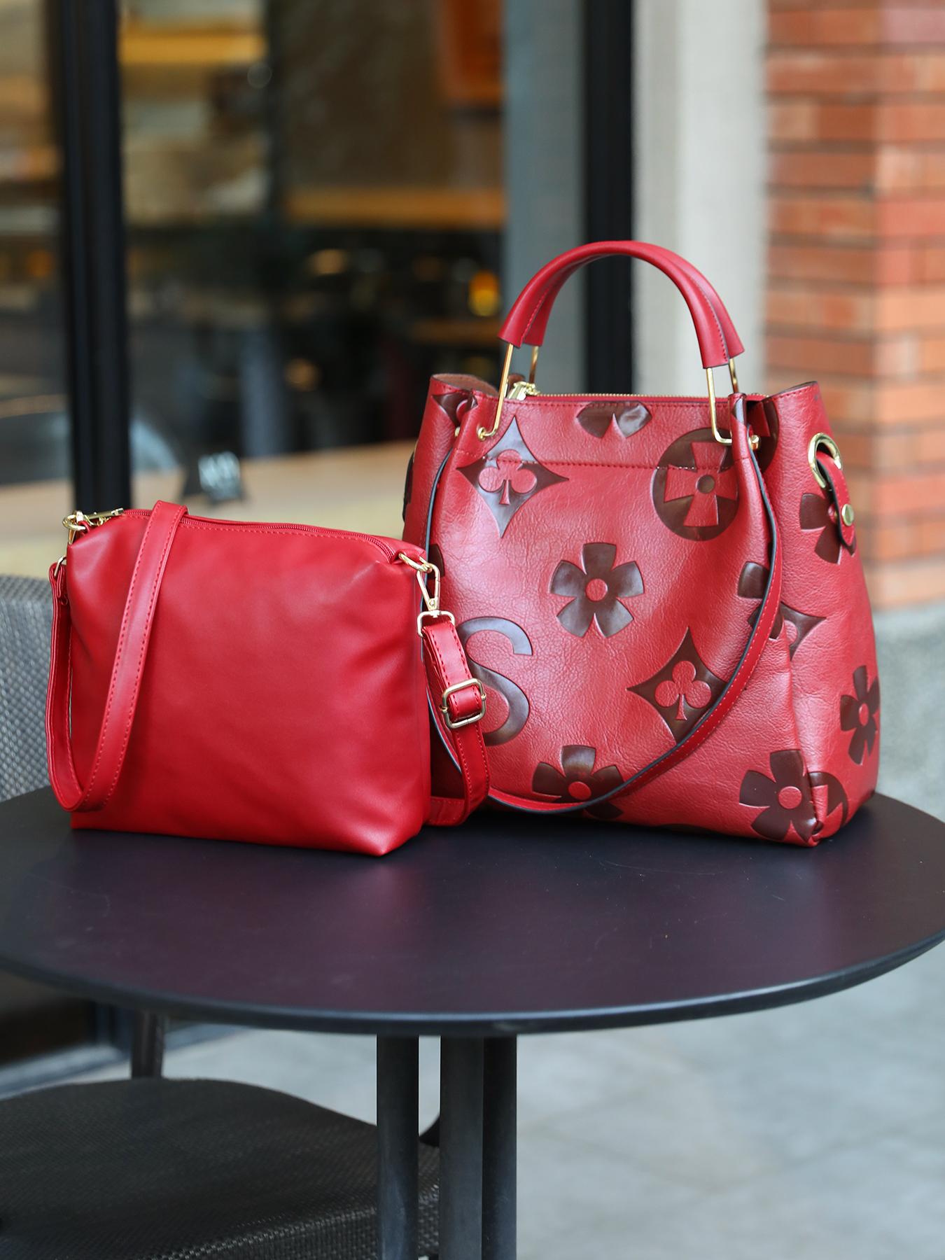 An elegant floral embossed faux leather handbag - suitable for women's use - fade resistant zipper tote bag - equipped with fixed shoulder straps - polyester lining - edge painted - suitable for work and various occasions