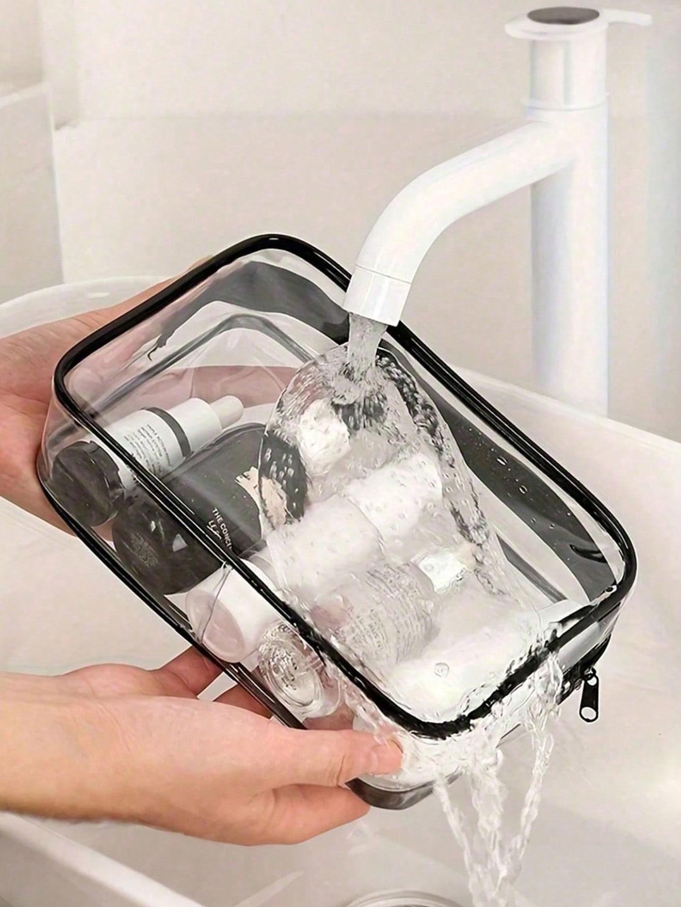 Clear PVC cosmetic bag with fun "Galaxy's Best Dentist" print. Waterproof and portable with zipper. Ideal for dentists, dental students and oral care lovers for work, travel and beach use.