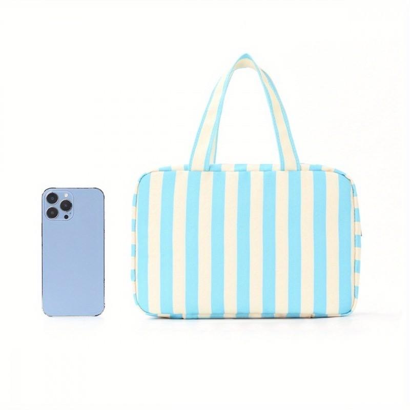 Multifunctional four-fold toiletry bag with hook; portable travel cosmetic storage bag; large capacity for storing cosmetics, medicines, and shampoo.