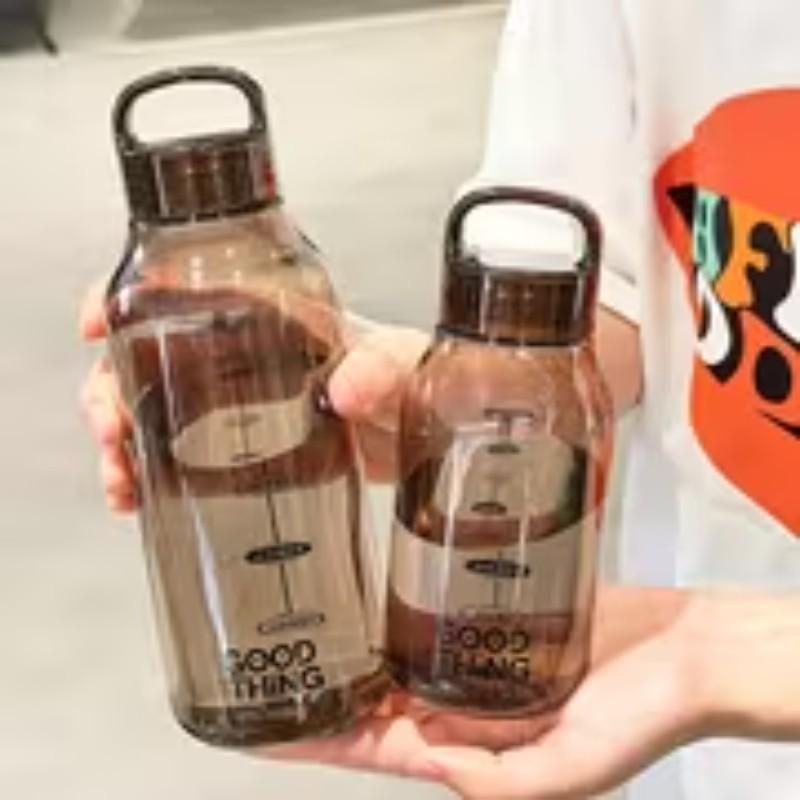 Minimalist transparent polycarbonate water bottle, leak-proof, heat-resistant, portable cup, suitable for school, home, office, outdoors, easy to carry, durable and stylish, suitable for daily use