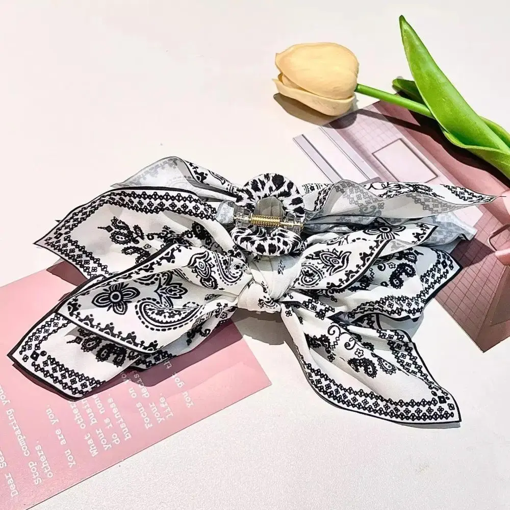 Paisley White