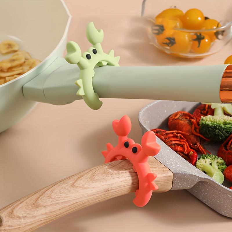 A set of 2 silicone spoon holders, featuring cute crab and octopus designs, heat-resistant spoon holders for kitchen utensils and scrapers, kitchen utensil organizer - perfect for gifts!
