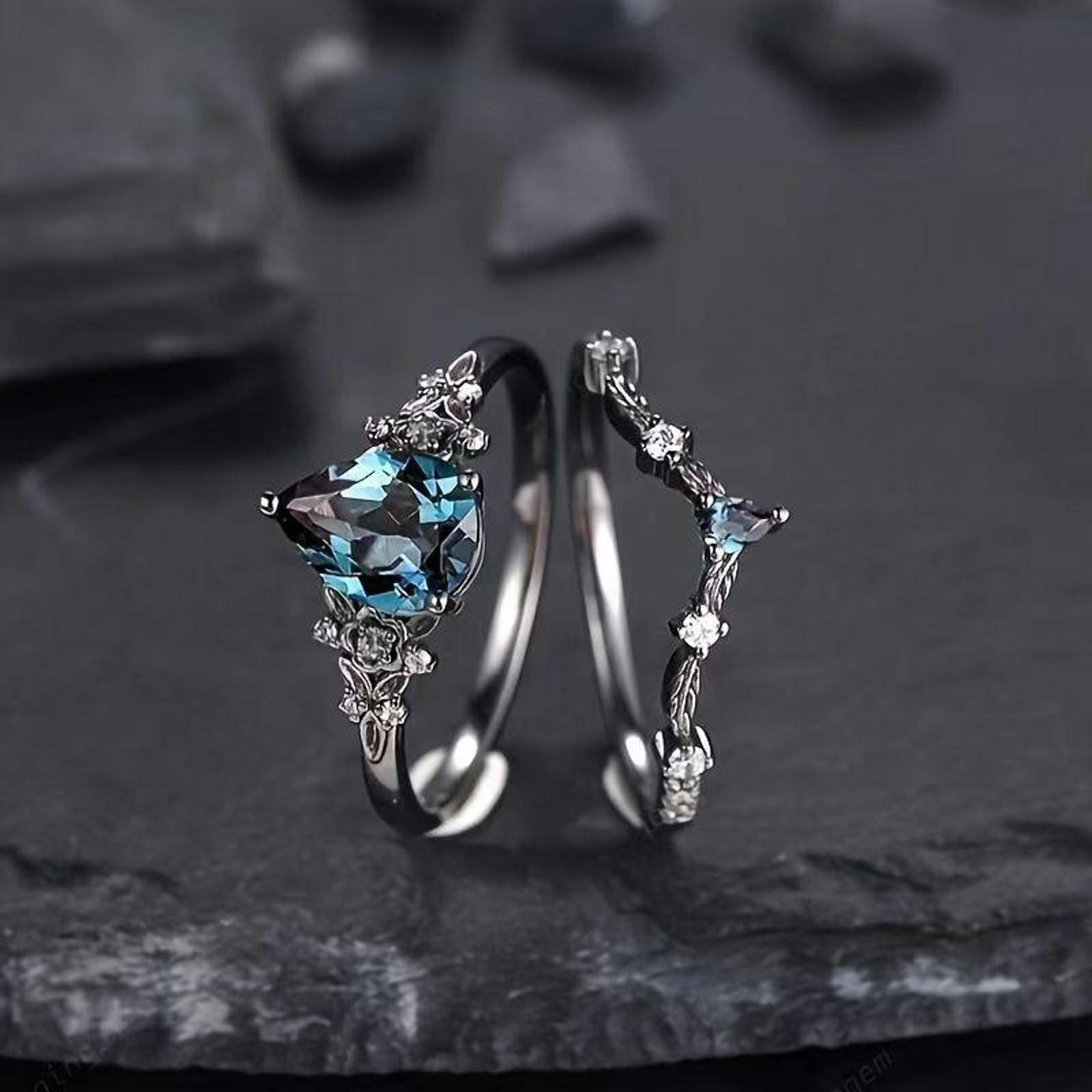 Deluxe sense light luxury personality fashion water drop blue diamond couple ring