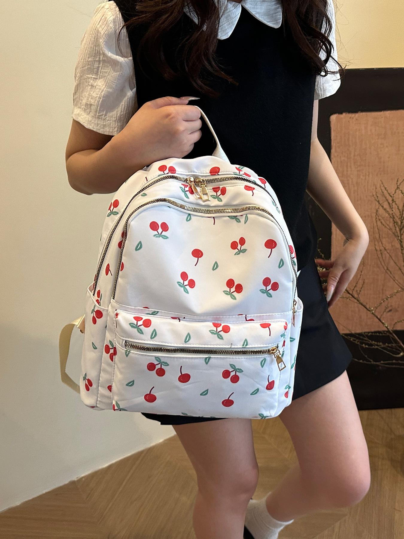 Sweet and fresh cherry element backpack, simple design, fashionable and exquisite, energetic campus style, versatile, light and practical, good for shopping and traveling, suitable for daily commuting  etc.