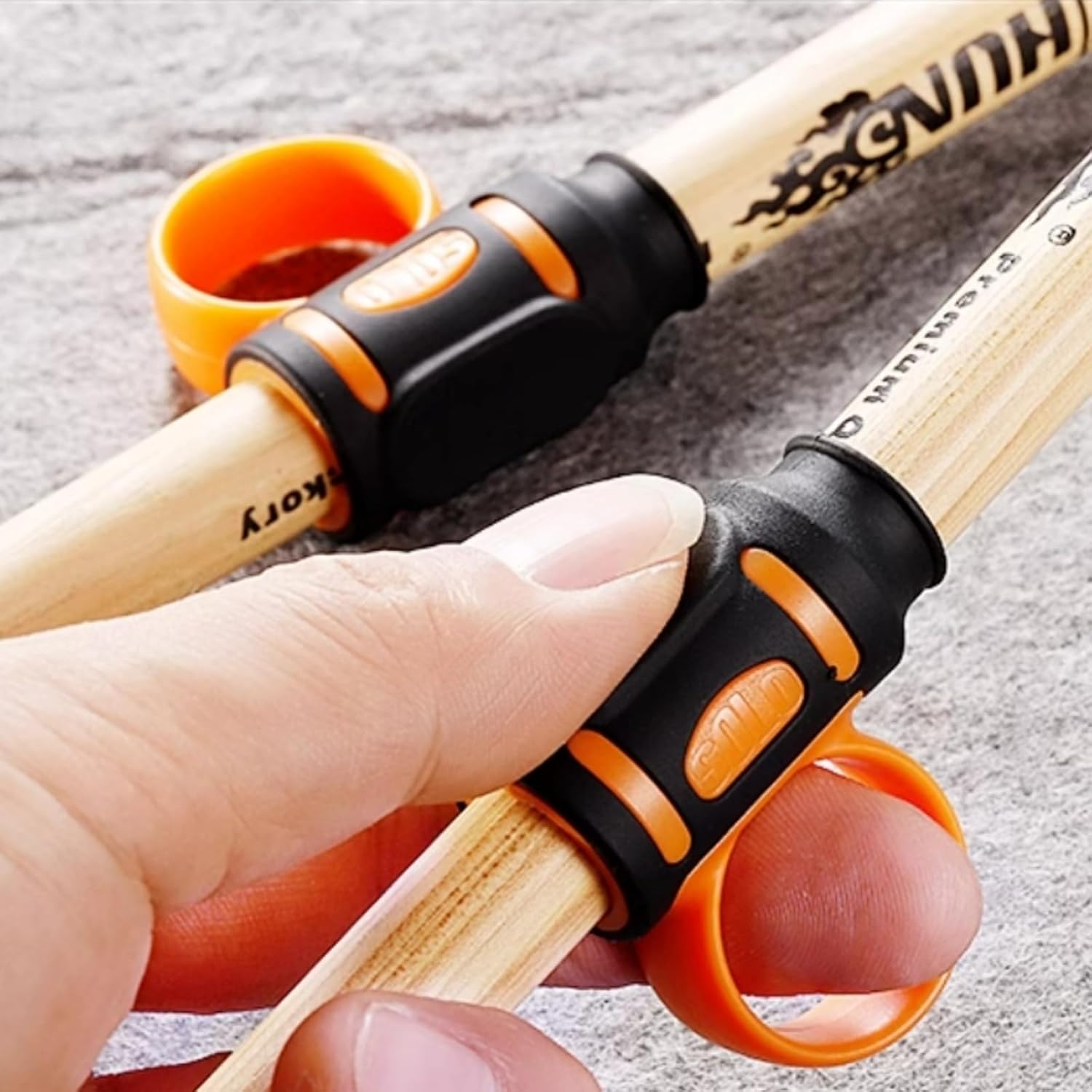 7A Drum Stick Control Clip Finger Drumsticks Aid Drum Stick Finger Controller  Drum Sticks Twirling Controller Auxiliary Drumsticks Finger Ring Anti-Slip 2 count(Black and Orange)