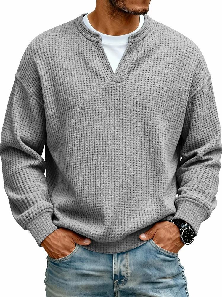 Men's layered long-sleeve shirt detail view