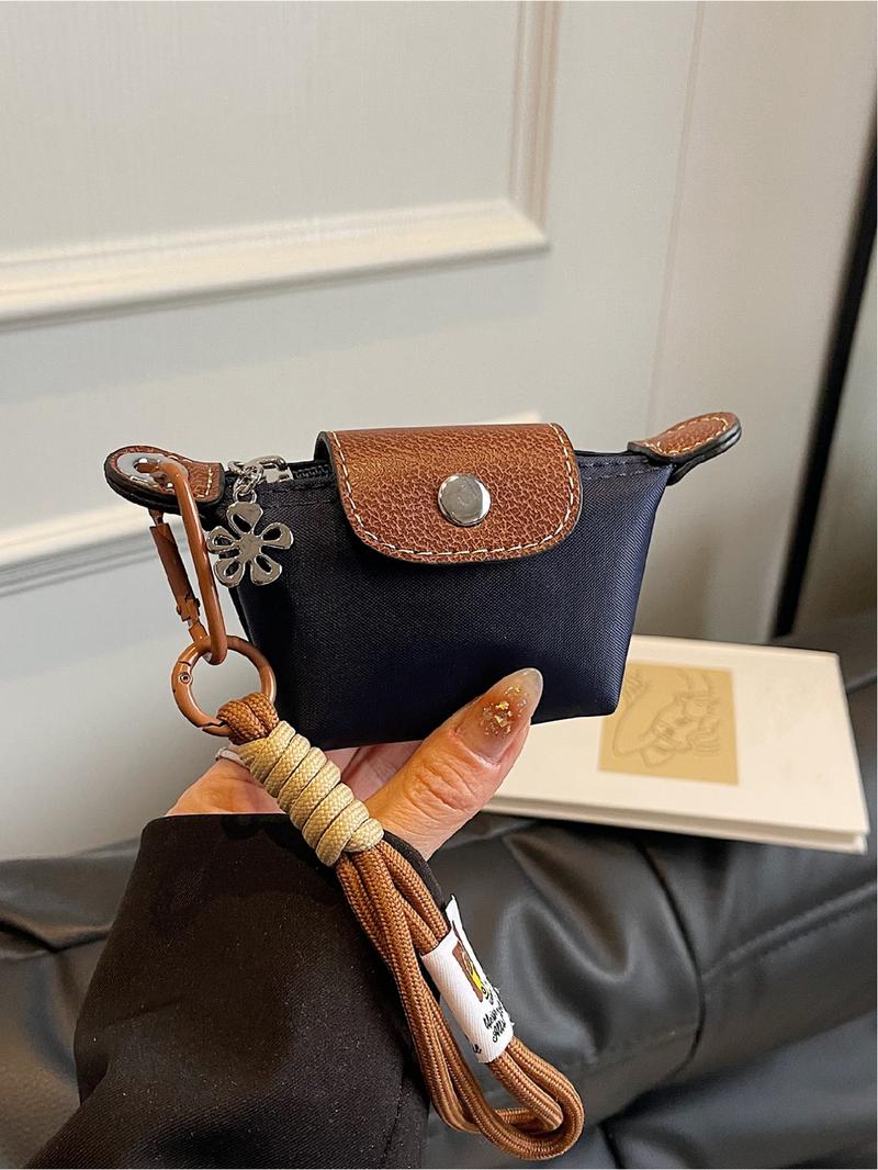 Mini women's flip button casual and compact handbag, wrist pocket, multiple colors to choose from, suitable for daily clothing matching, fashionable for going out.