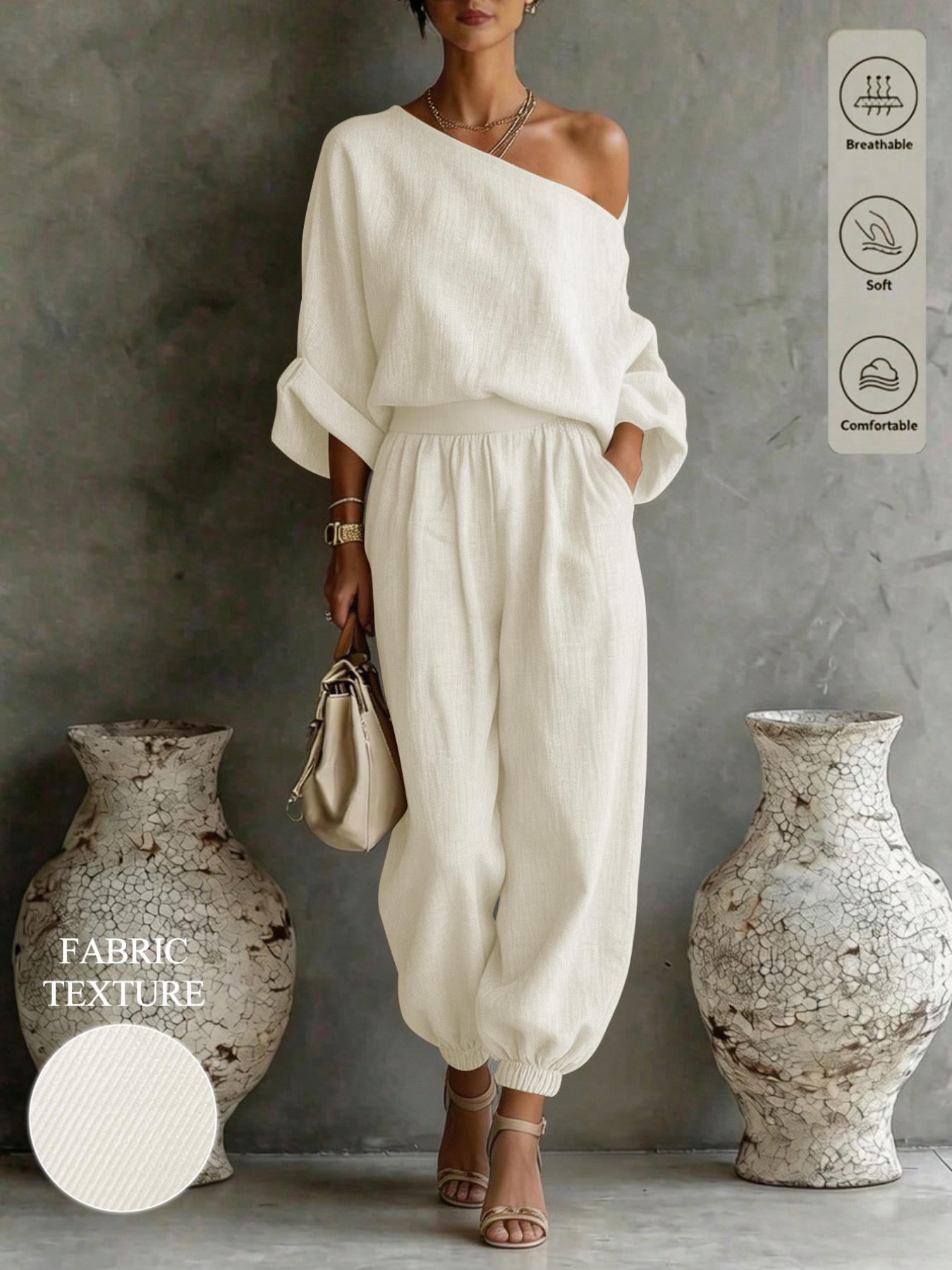 Women's solid color casual asymmetrical neck top paired with elastic waist trousers, a country-style two-piece set, Everyday suitable for daily commuting and all seasons.