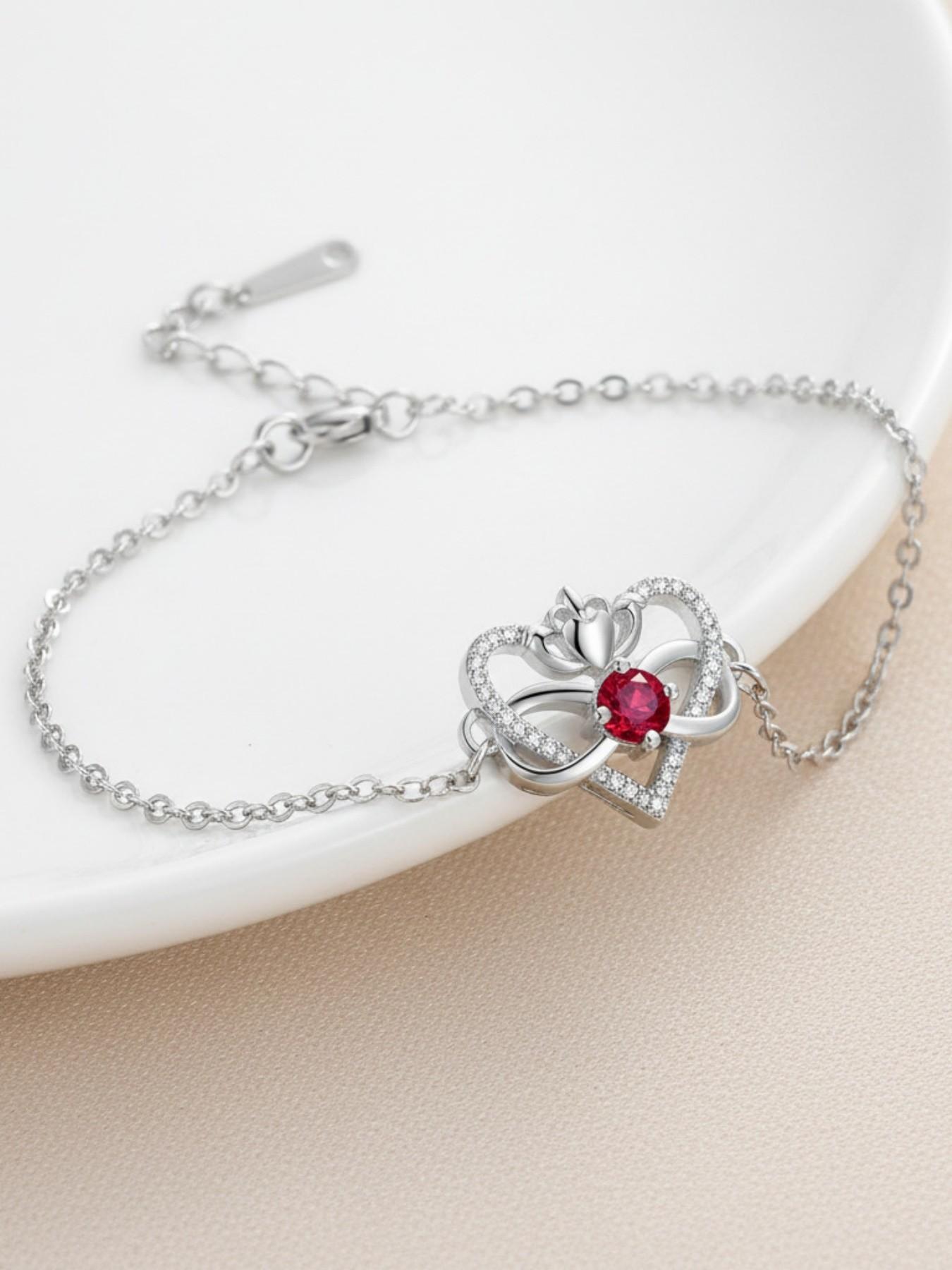 Heart Crown Queen · Ruby Bracelet Unique premium heart bracelet with delicate zircon infinity symbol, elegant and versatile.Comes with a card for Mom or daughter.Perfect mysterious gift for your daughter and ideal for Mother’s Day.