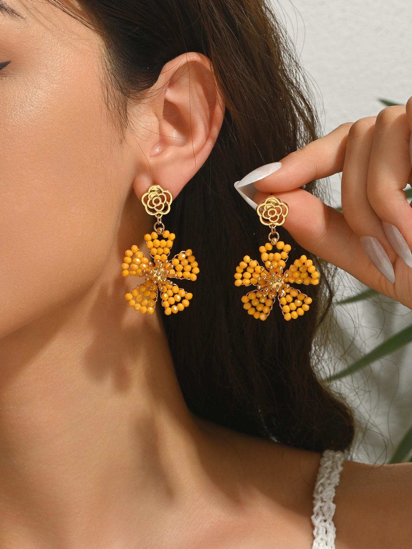 A pair of handcrafted, bohemian-style vintage dangle earrings featuring beaded floral designs—the perfect gift for a loved one, mother, or friend. An ideal present for Valentine's Day, Mother's Day, International Women's Day, wedding season, Thanksgiving