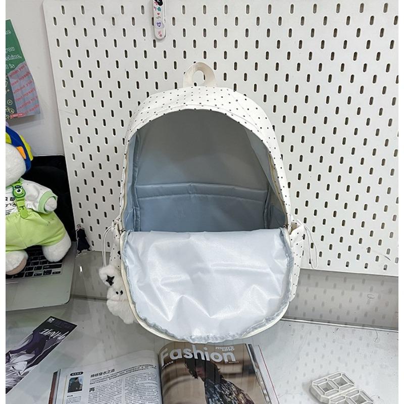 Women's piano-shaped backpack—a cute, polka-dot nylon bag that can be worn as a shoulder bag or backpack. It features an elegant, sweet style with a playful touch, making it perfect for school, commuting, shopping, travel, or as a holiday gift