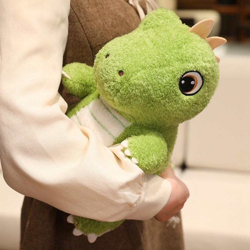 Cute green dinosaur plush toy with adorable, big eyes and endearing expressions, perfect for kids. Soft and comfortable, it can be used as a sofa cushion. A fun gift for children’s festivals, birthdays, or Christmas.