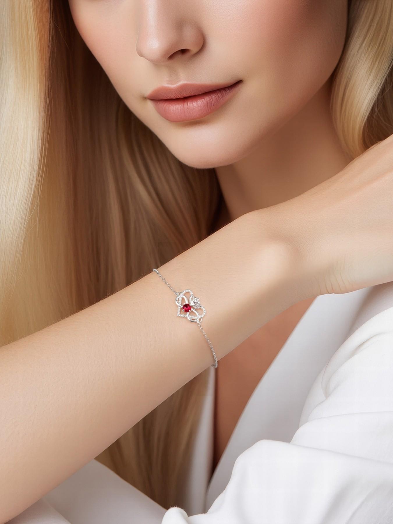 Heart Crown Queen · Ruby Bracelet Unique premium heart bracelet with delicate zircon infinity symbol, elegant and versatile.Comes with a card for Mom or daughter.Perfect mysterious gift for your daughter and ideal for Mother’s Day.