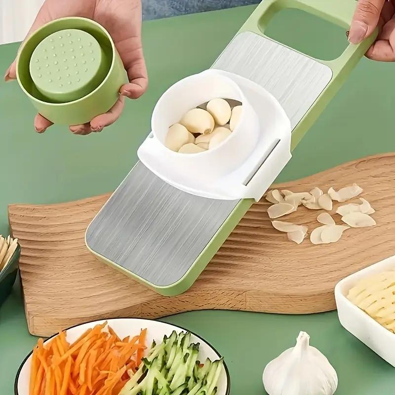 Multifunctional kitchen vegetable cutter. Its design meets the needs of shredding, slicing, grating, etc. It is made of healthy materials, with sharp cutting edges, and is easy to operate and clean.