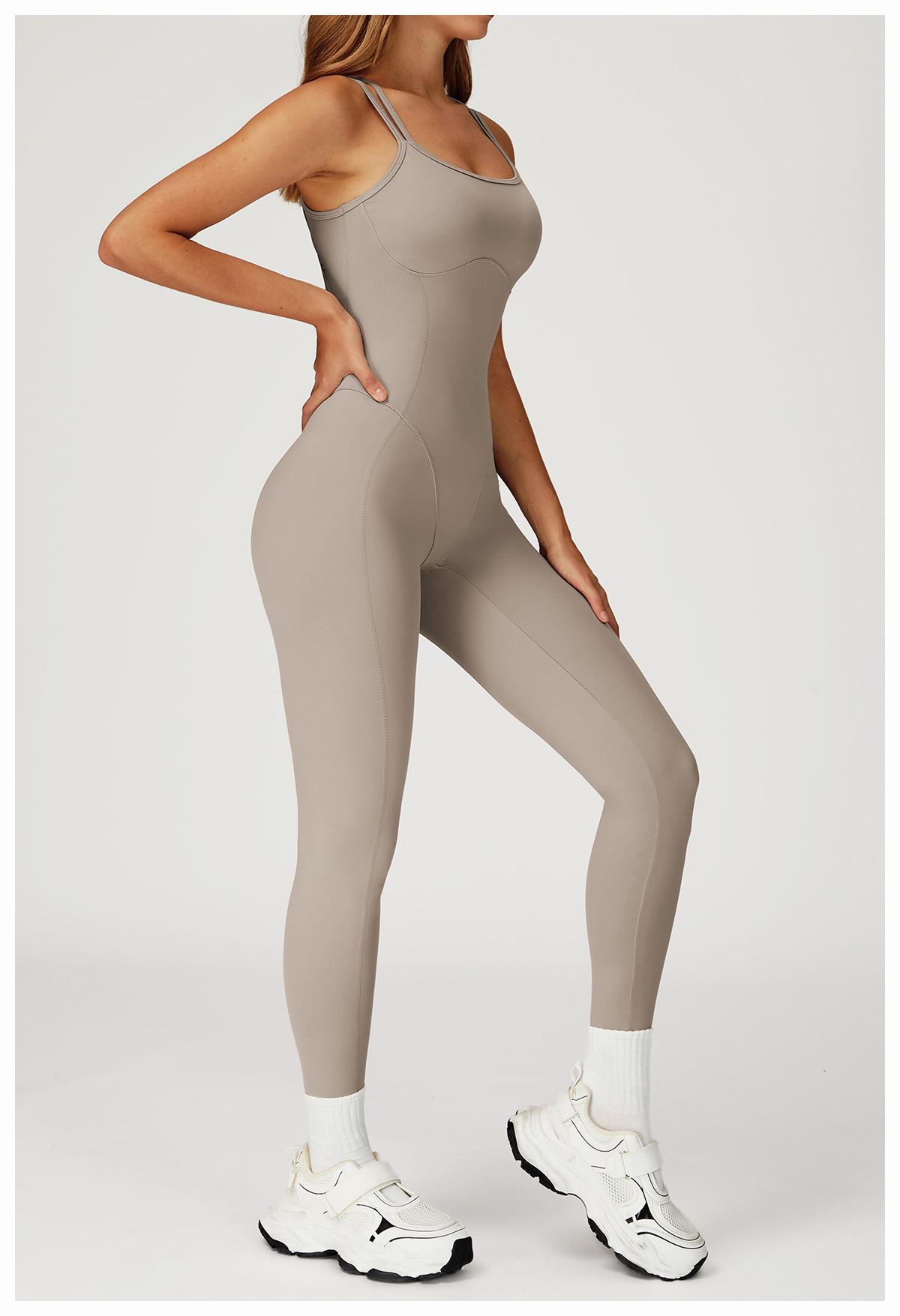 Nude-feel one-piece bodysuit with cross-back design, slim-fit yoga wear for outdoor running and fitness activities