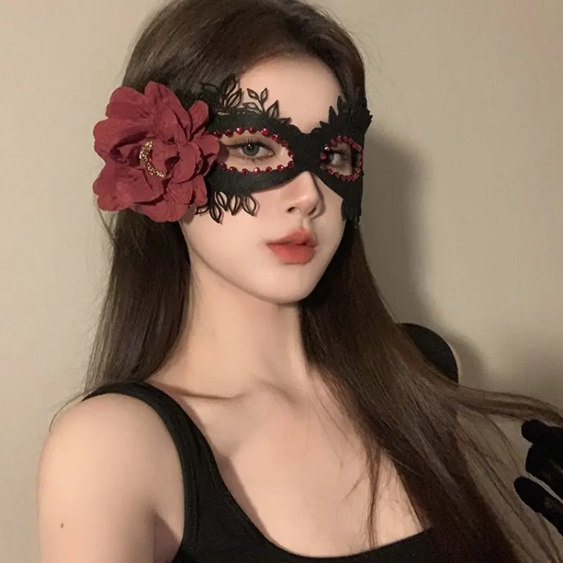 Elegant black lace masquerade eye mask featuring 3D burgundy flowers and rhinestone trim; Venetian-style mask—an ideal accessory for women's costumes for Halloween, masquerade balls, and carnivals.