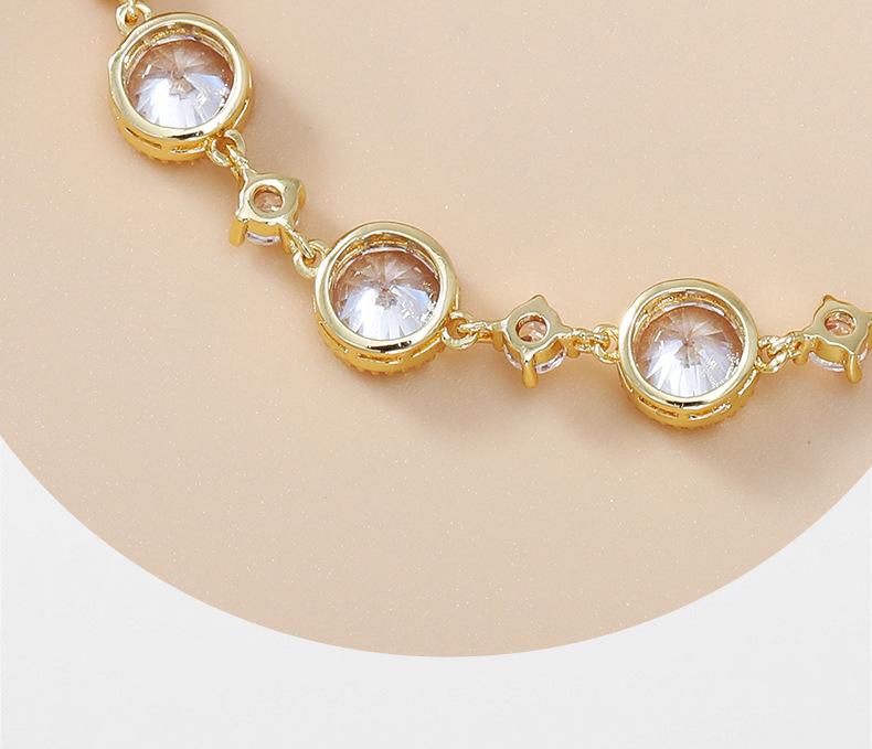 Light luxury style exquisite high-end champagne gold round zircon bracelet, new niche fashion women's hand accessory with pull-string design