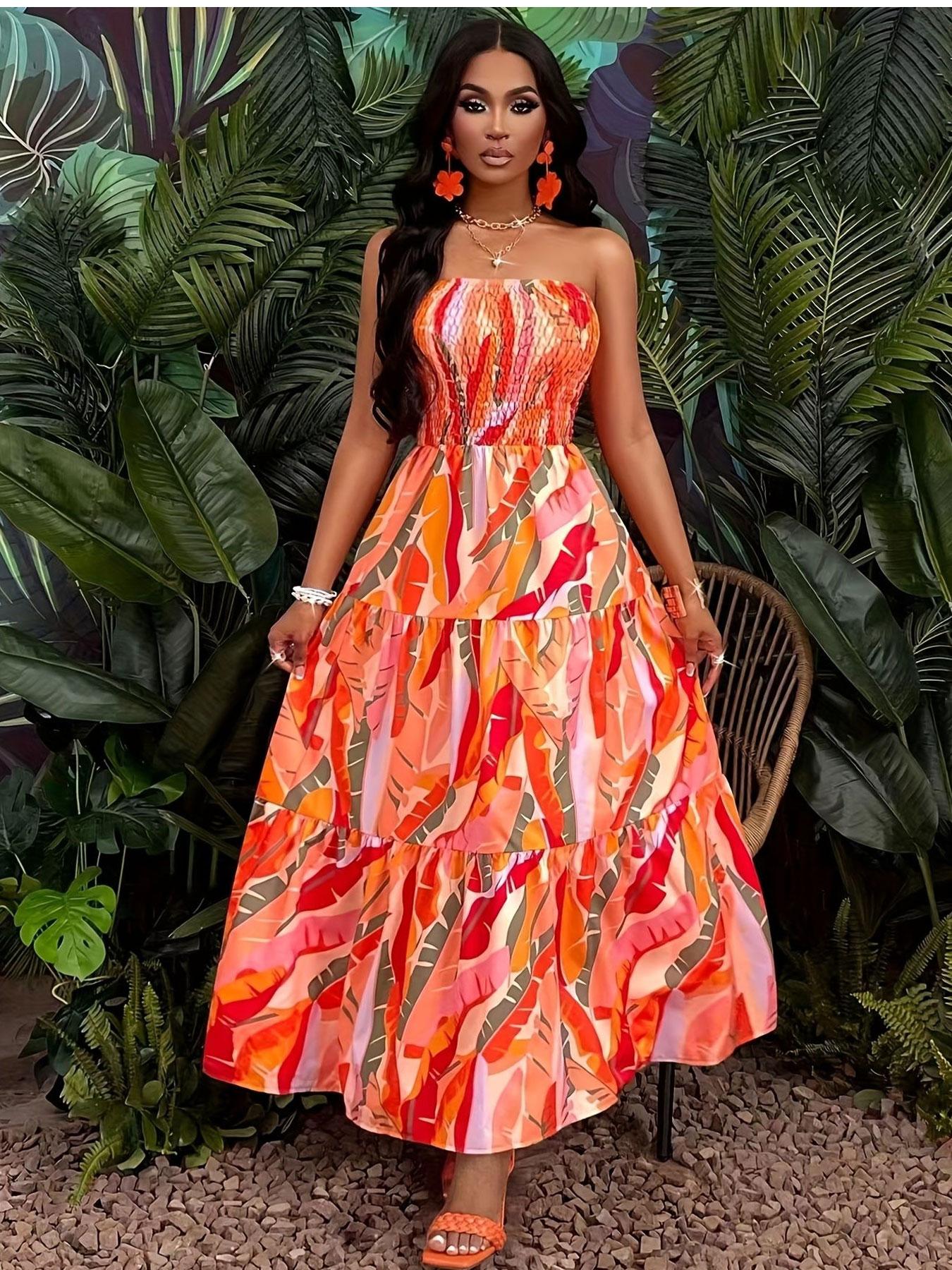 A women's orange-red color-block tropical floral print strapless tube long fashionable dress, suitable for summer, island vacations, tropical trips, and summer parties.