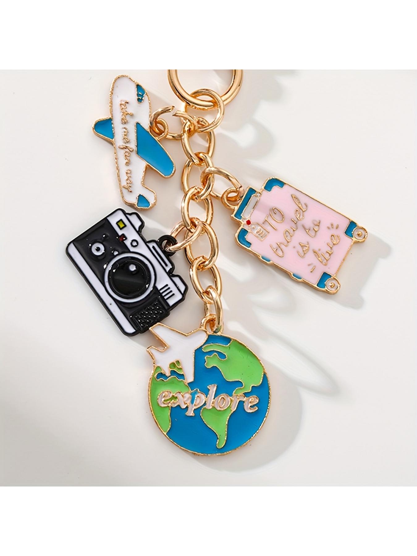 1pc Travel-themed keychains - Containing aircraft, camera, Earth and luggage accessories, stylish enameled metal keychains are perfect for decorating and the perfect gift for travelers