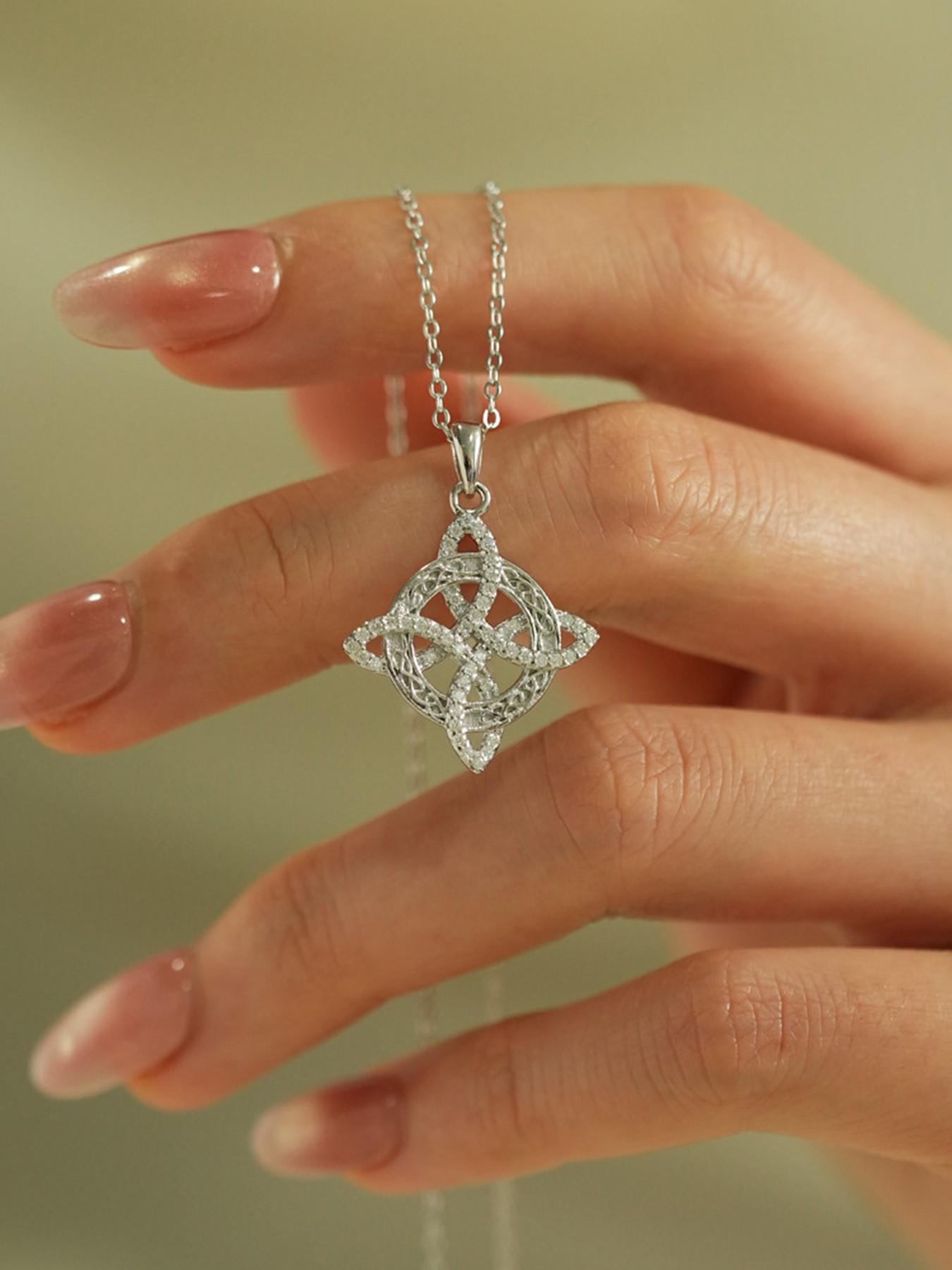 Classic Witch's Knot Necklace — A Luxurious Gold/Silver-Tone White Crystal Necklace for Women, Featuring a Zircon-Inlaid Trinity Knot. A Symbol of Good Luck, This CZ Pendant Serves as a Witchcraft Talisman and Protective Wiccan Jewelry.